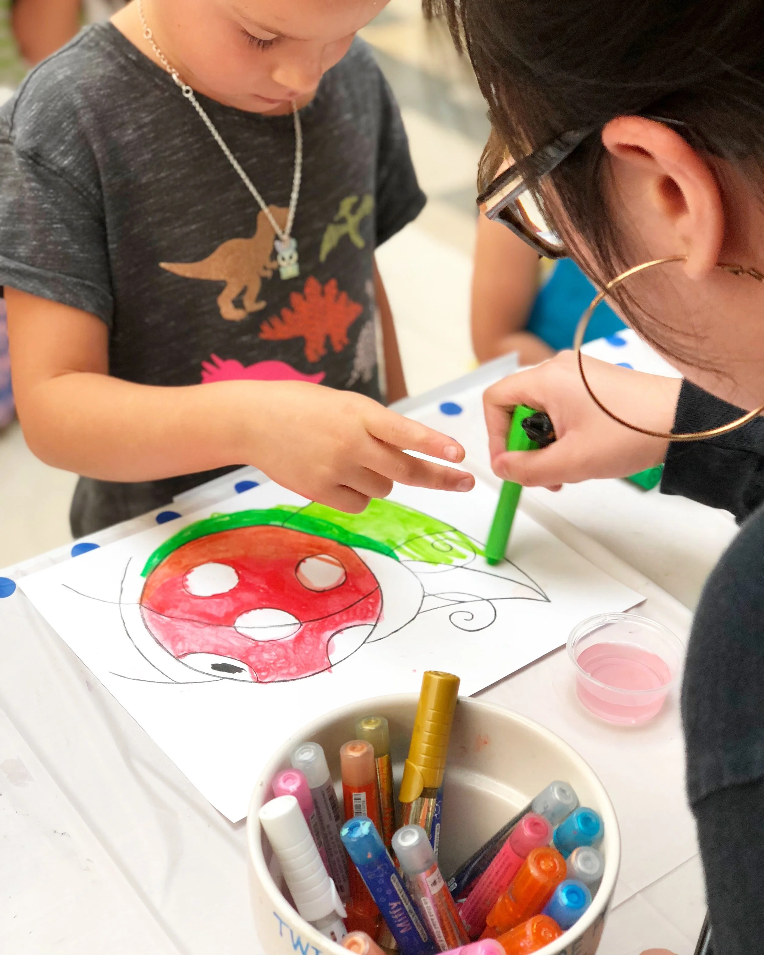 Image of students taking art class.