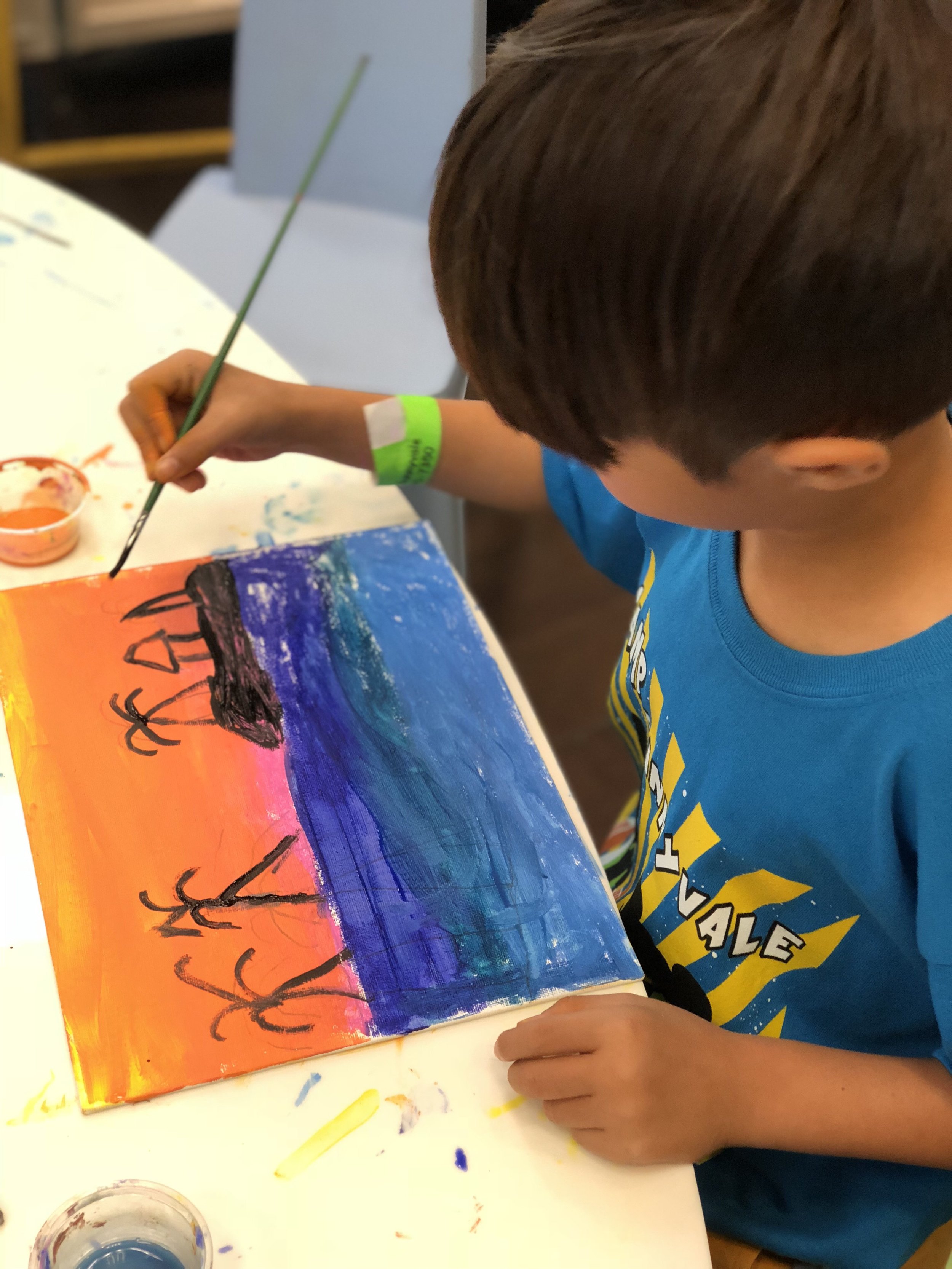 Image of students taking art class.