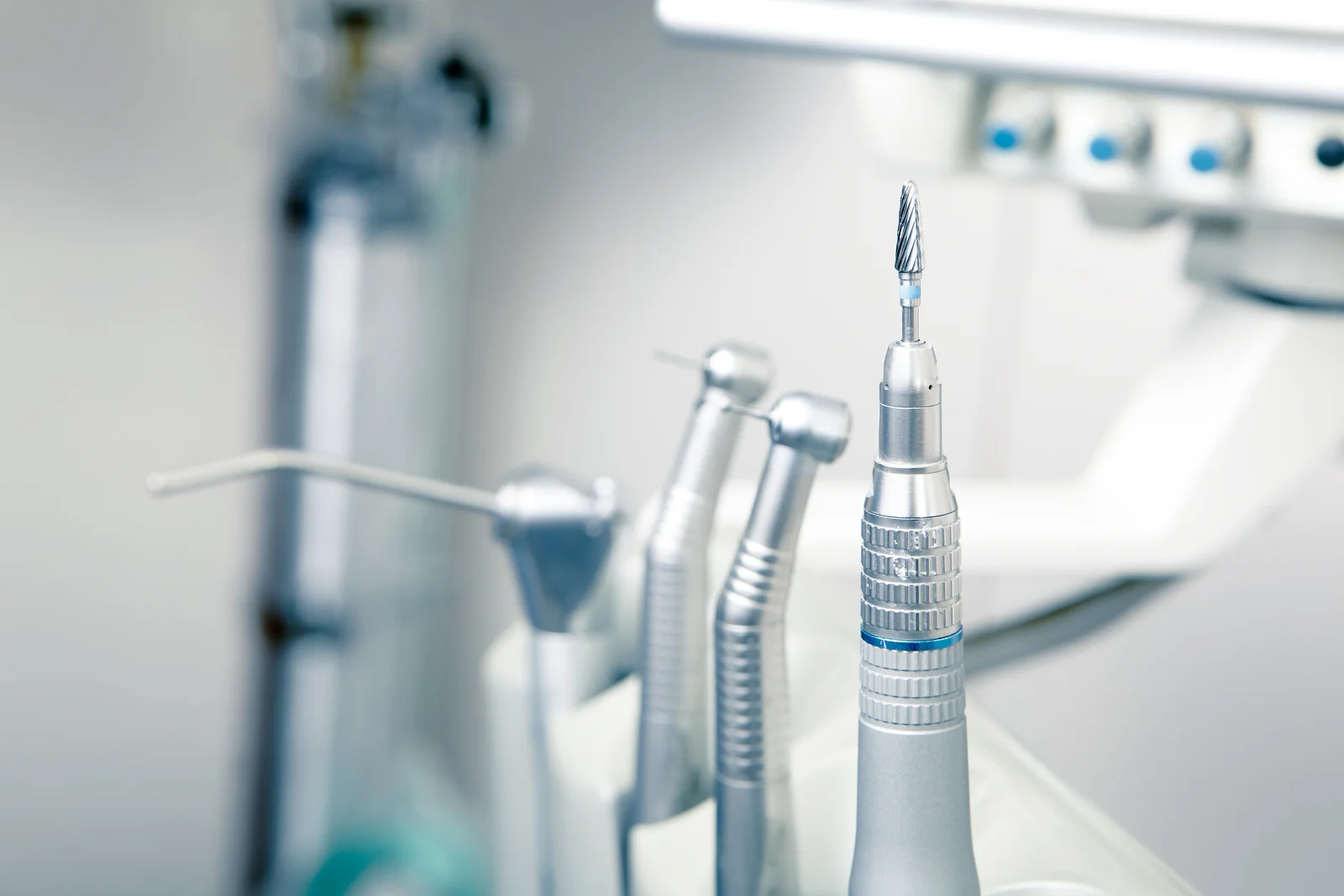 bigstock-Metallic-Dentist-Tools-Close-U-51185254.jpg