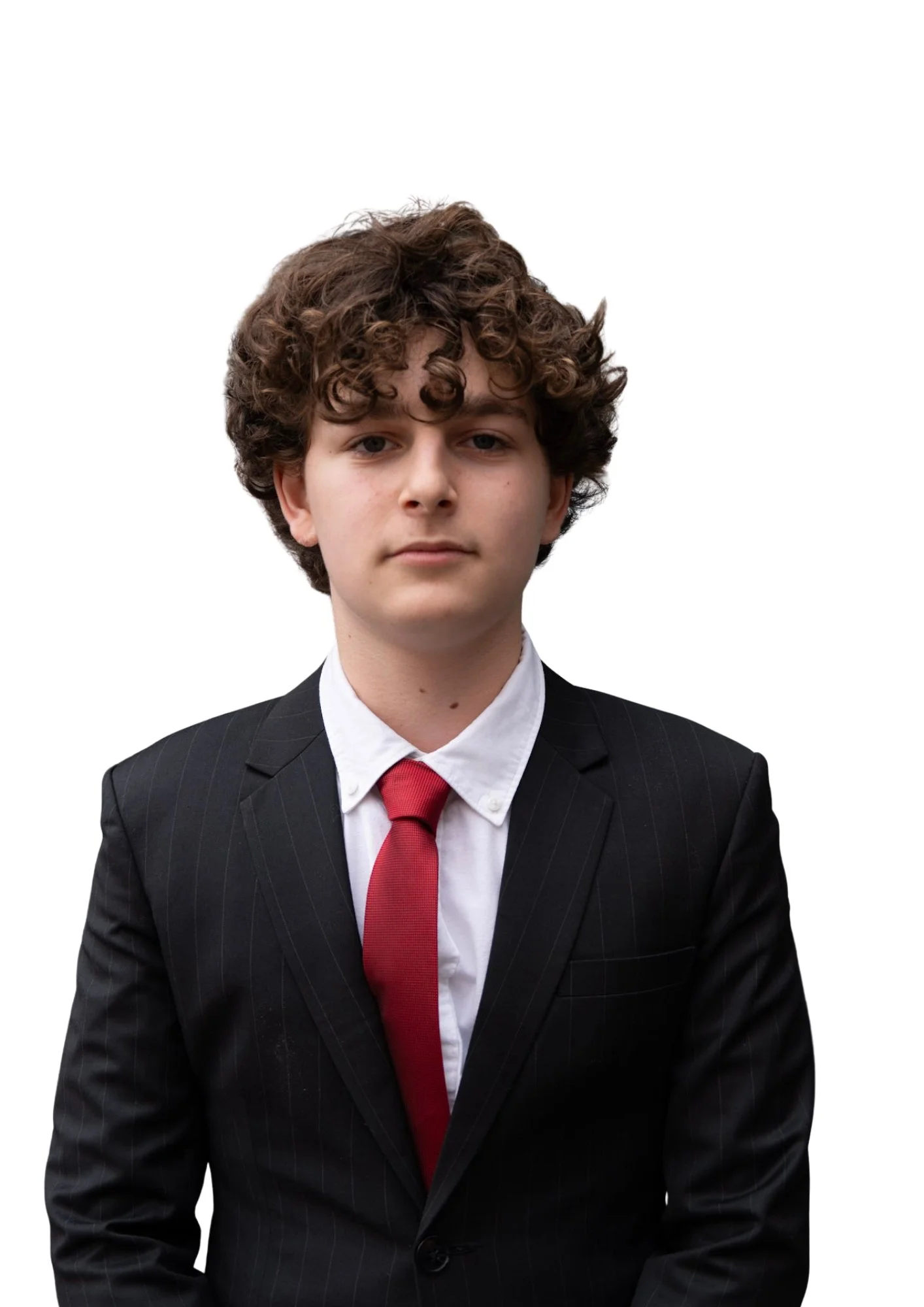Young man in a black pinstripe suit, white shirt, and red tie, against a plain white background.