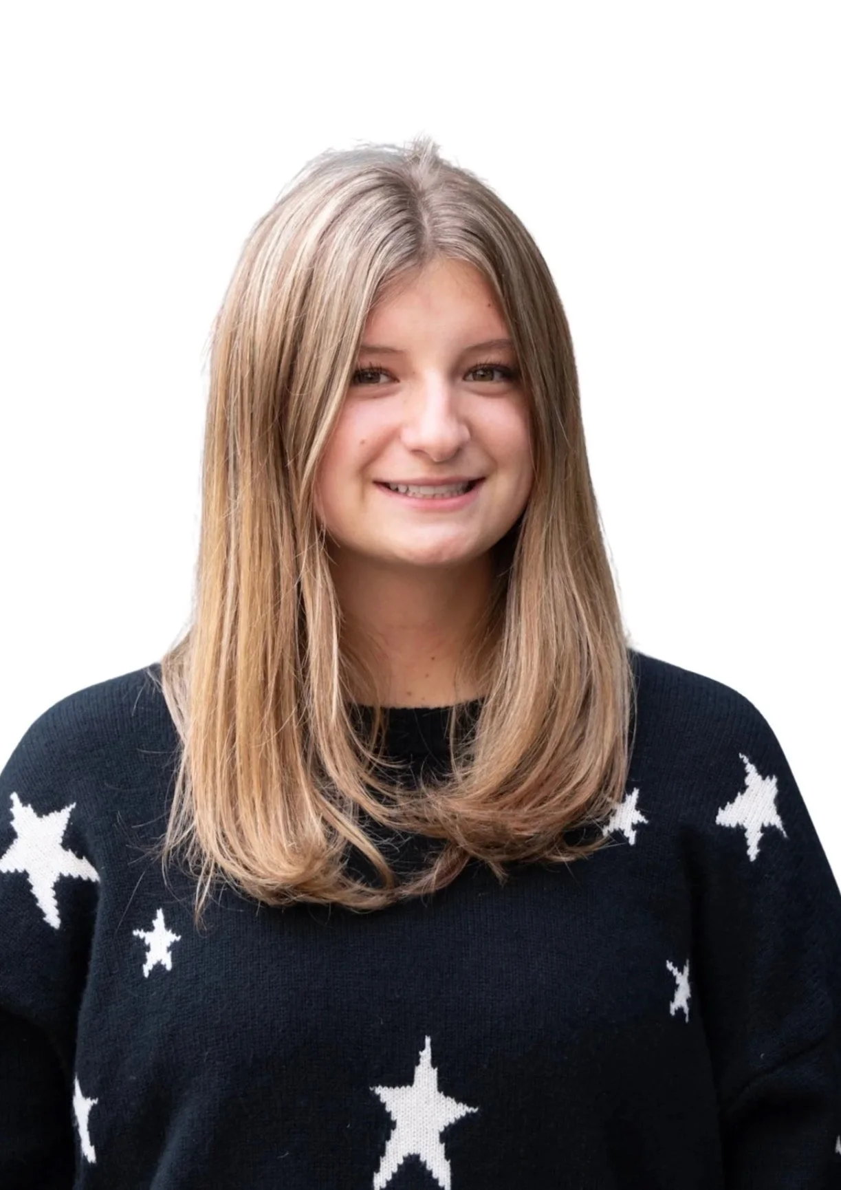 A young woman with long blonde hair smiling, wearing a black sweater with white stars, against a plain white background.