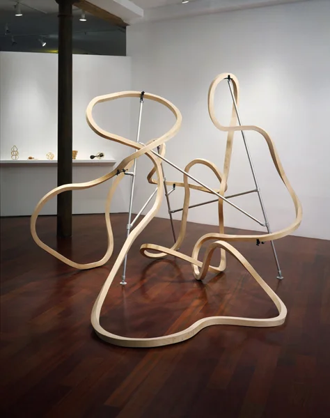   A Circuitous Route to You,&nbsp;  2005  Plywood, maple veneer, and aluminum with structural fittings  89 x 109 x 144 inches       