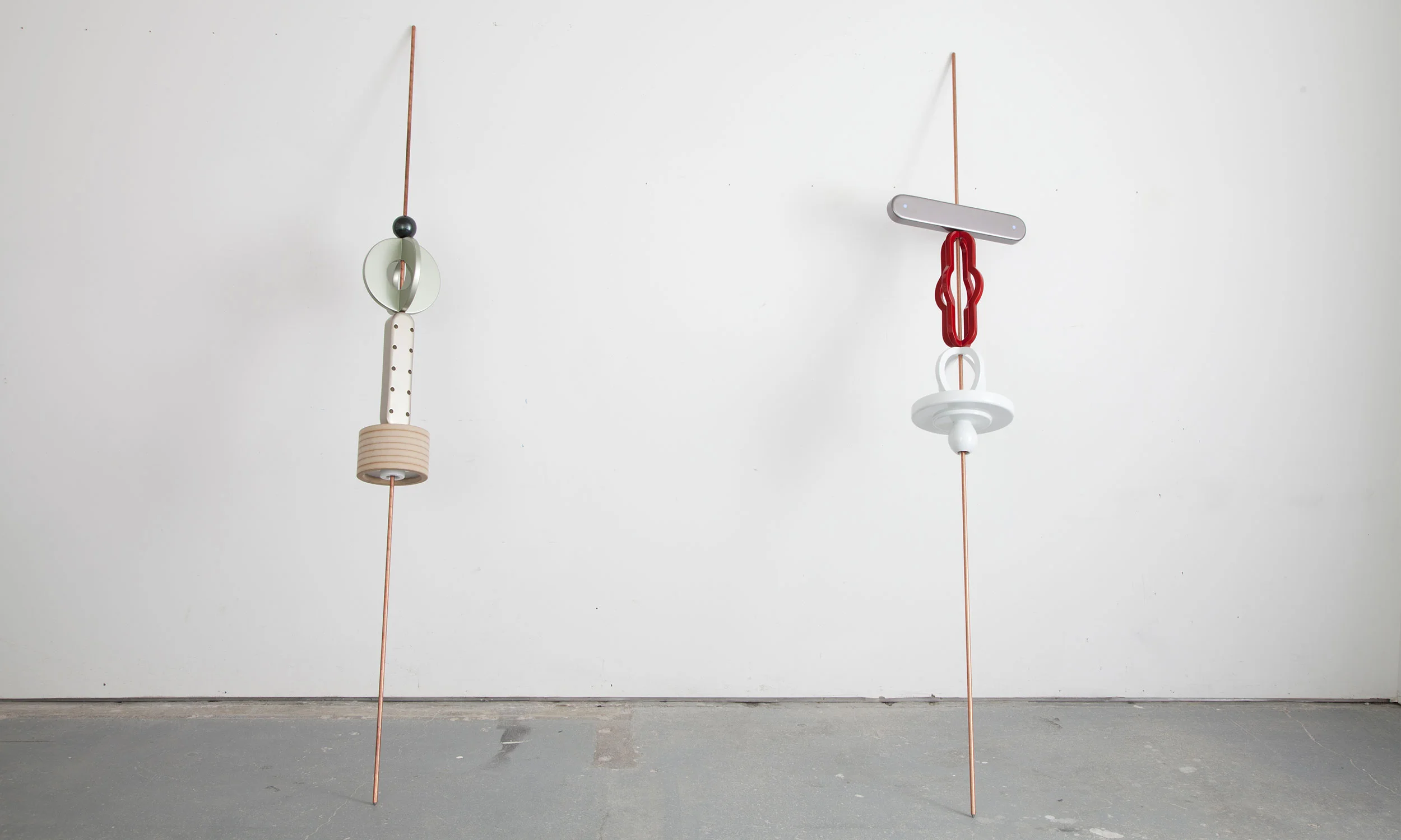 SBM5 (Stand By Me 5), 2013 Copper coated steel rod, MDF and Paints 19 x 19 x 96 in Left: SBM6 (Stand By Me 6), 2013 Copper coated steel rod, MDF and Paints 9.5 x 9.5 x 96 in