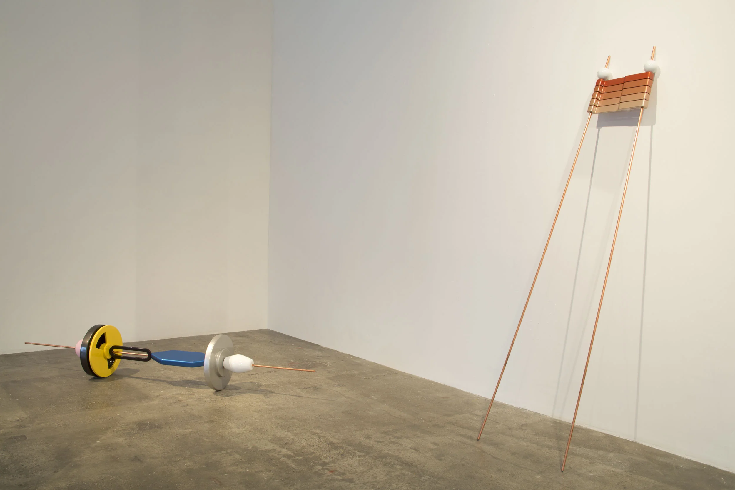 SBMLD1 , 2012 Copper coated steel rod and painted MDF, 96 x 15.5 x 15.5 in Right: DSBM1 , 2014 Copper coated steel rod and painted MDF, 6 x 24 x 4 in