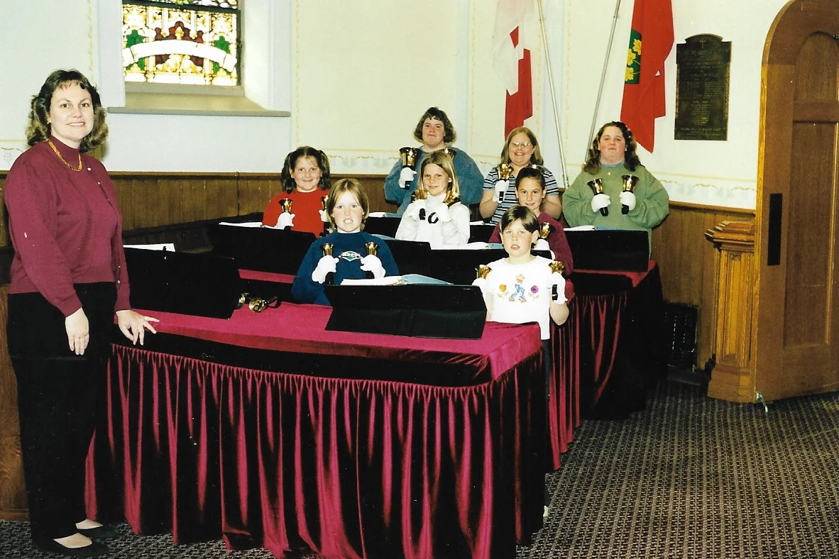 Hand Bells 1999 Back Row L-R: Heather Johnston, Michelle Mack, Nicole Kaufman Middle Row L-R: Cory Newbigging, Lauren Karges, Alicia Lockie Front Row L-R: Agnes Lockie/Henderson (Director); Terry Brown, Brittany McDonald