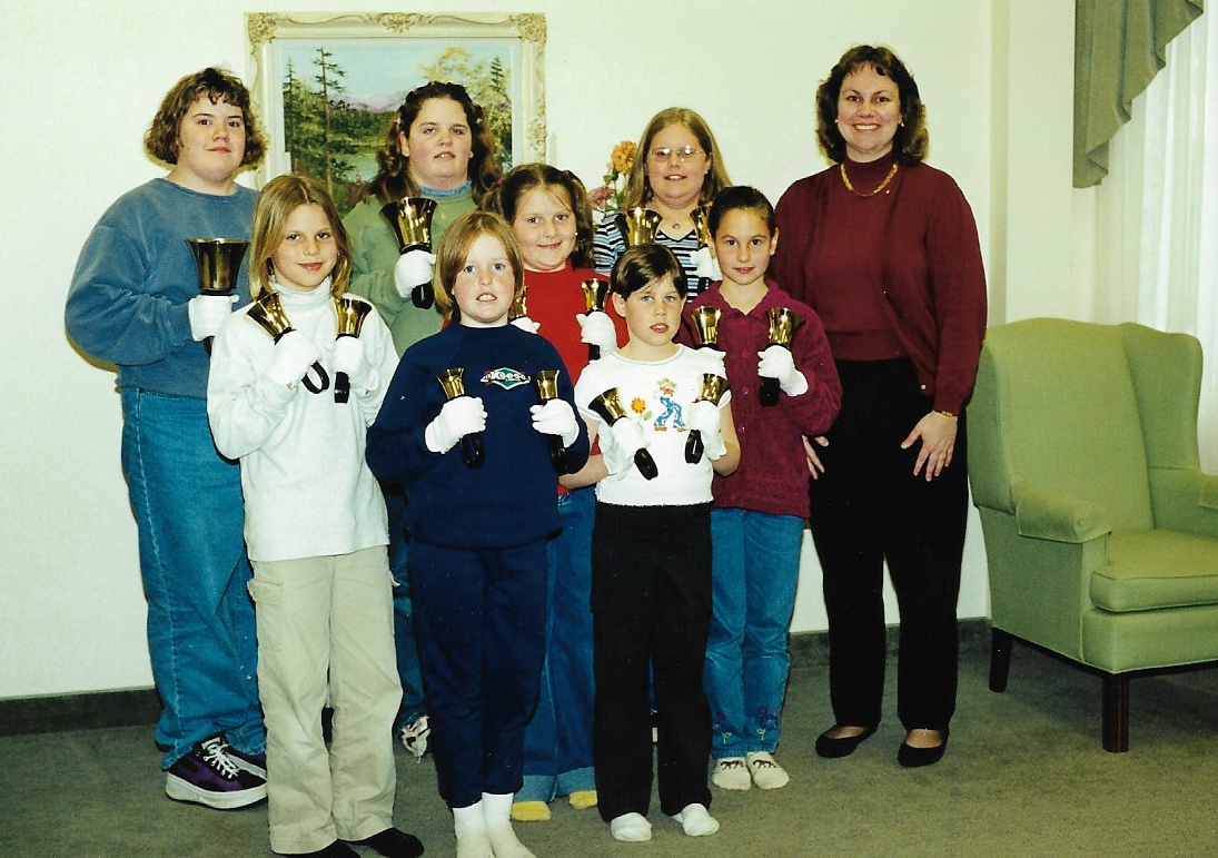 Hand Bells 1999 Back Row L-R: Heather Johnston, Nicole Kaufman, Michelle Mack, Agnes Lockie/Henderson (Director) Middle Row L-R: Lauren Karges, Cory Newbigging, Alicia Lockie Front Row L-R: Terri Brown, Brittany McDonald