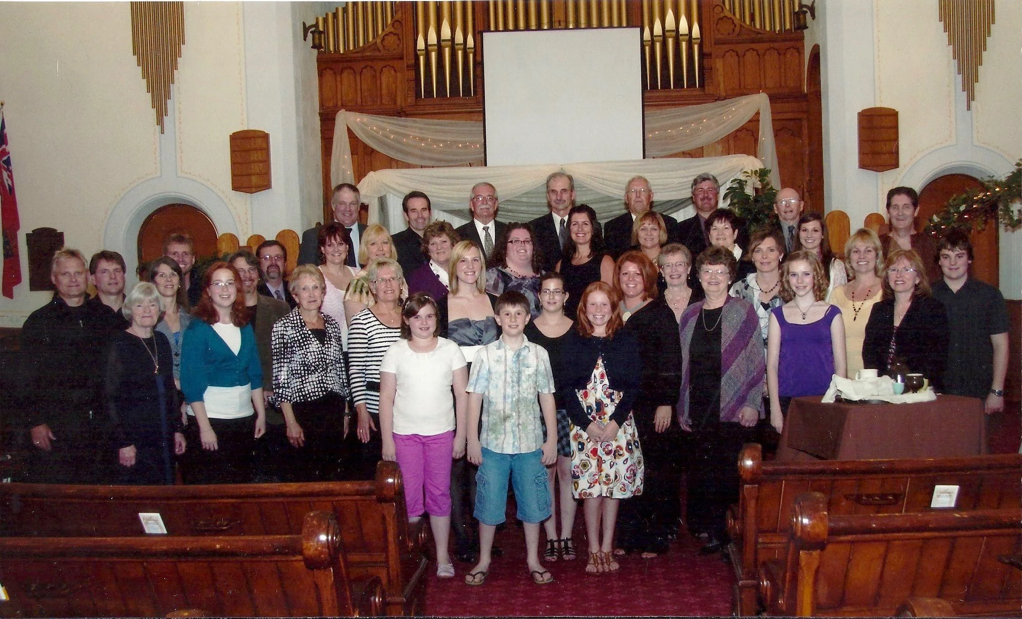 “A Week Like None Other” April 2010 Back L-R: Doug Johnston, Larry Skinner, Don Harrison, Paul Karges, Jim Henderson, Brian Hamilton ,Charlie Corry, Blair Burns (storyteller) 4th row: Chris McIntosh(drums), John Chapman, Kim Henderson, Laura Tryssenaar, Julie Newbigging, Nicole Kaufman, Lynn Kerr, Kelly Henderson, Jean Jinkinson, Alicia Lockie 3rd row: (left side) Brian McMurren (bass guitar), Janet McDonald (keyboard), Paul Dekker (sound) (right side) Deanne Cressman, Jill Reading, Agnes Henderson(piano), Paul Lockie(powerpoint) 2nd row: Doug Boertien (guitar), Grace Burrough, Gloria McCallum, Marlene Henderson, Lois Aitchison, Karli Purcell, Stephanie Hamilton, Michelle Hemingway, Ethel Corry, Kathleen Skinner, Nancy Skinner (director for performance) Front row: (cast) Brooklyn Johnston, Ryan Mayes, Erica Hemingway