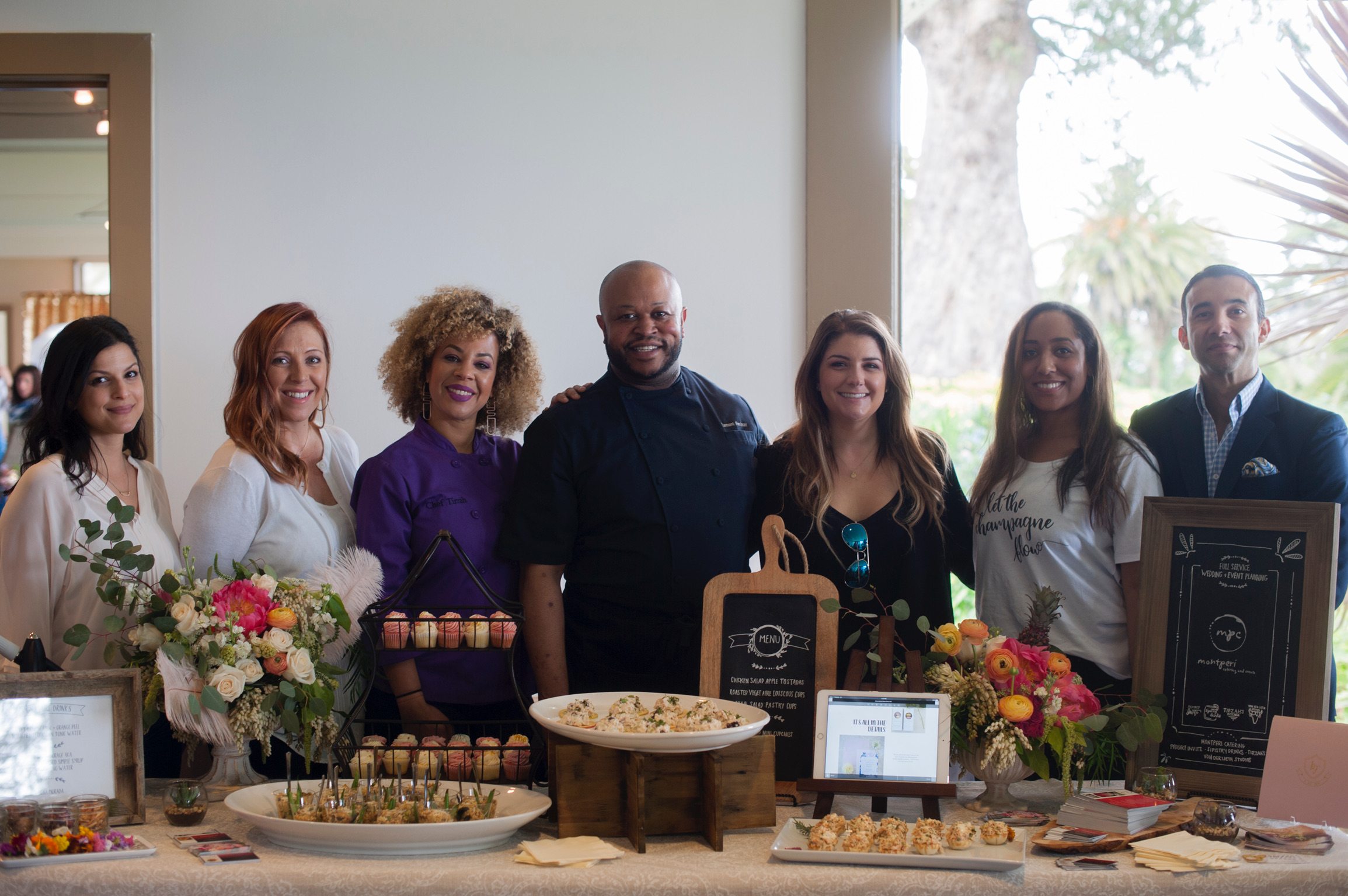 Pictured: Here we have our amazing team! Project Invite, Montperi Catering, Sipistry Drinks, Tirzahs Kitchen, and ,of course, von der Leith Studios owners behind our beautiful table for the showcase.