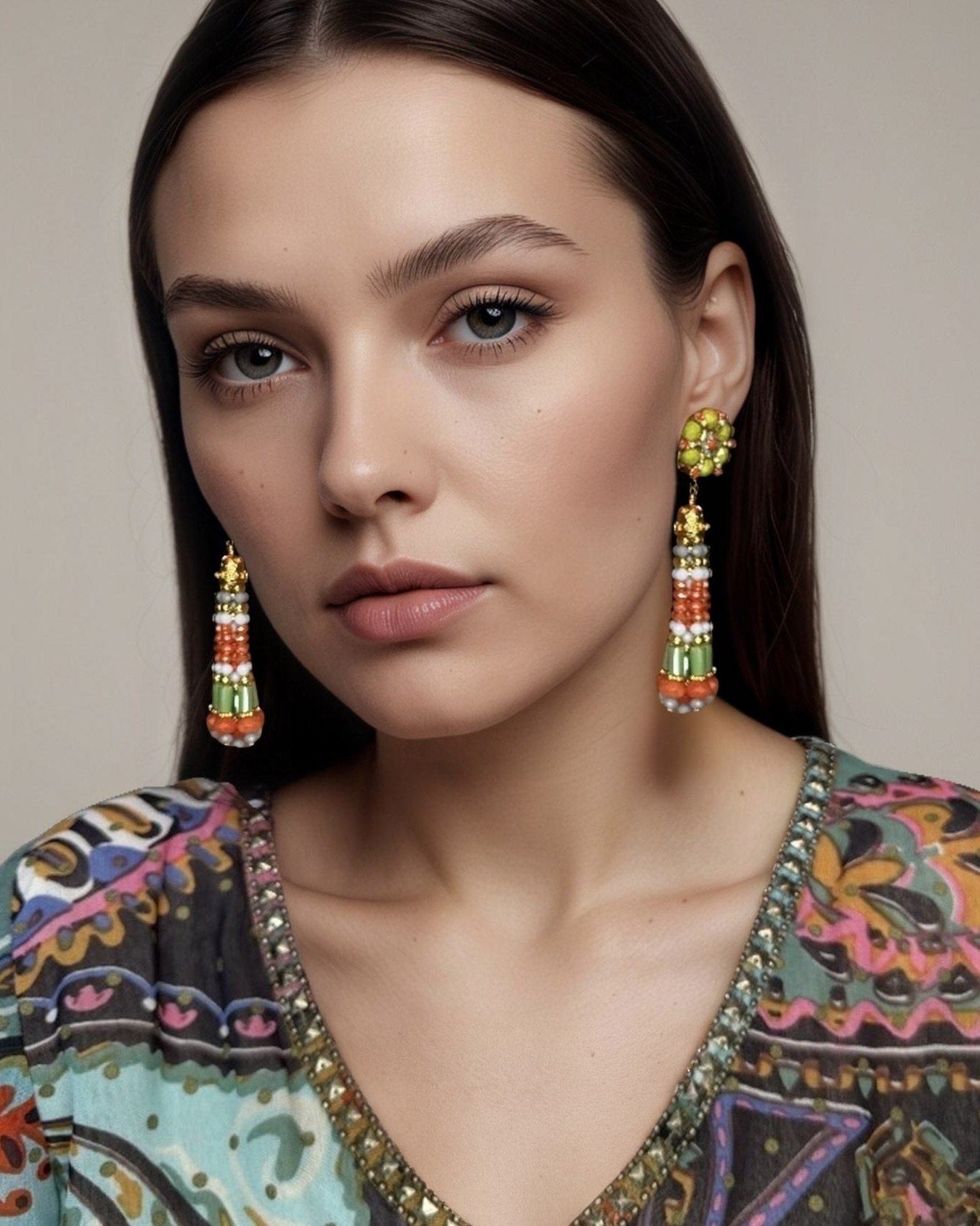 orange chartruse tassel earrings on model.jpeg