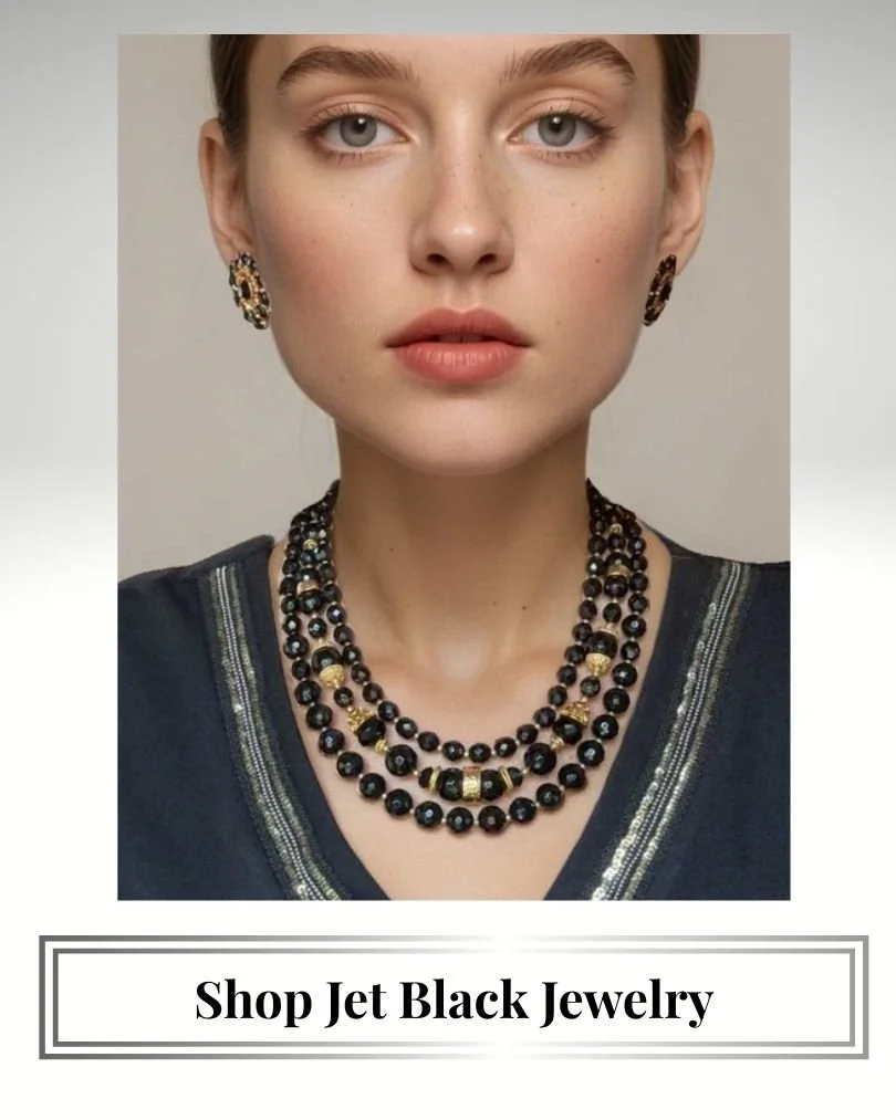 jet black 3 strand necklace and matching earrings on model.jpeg