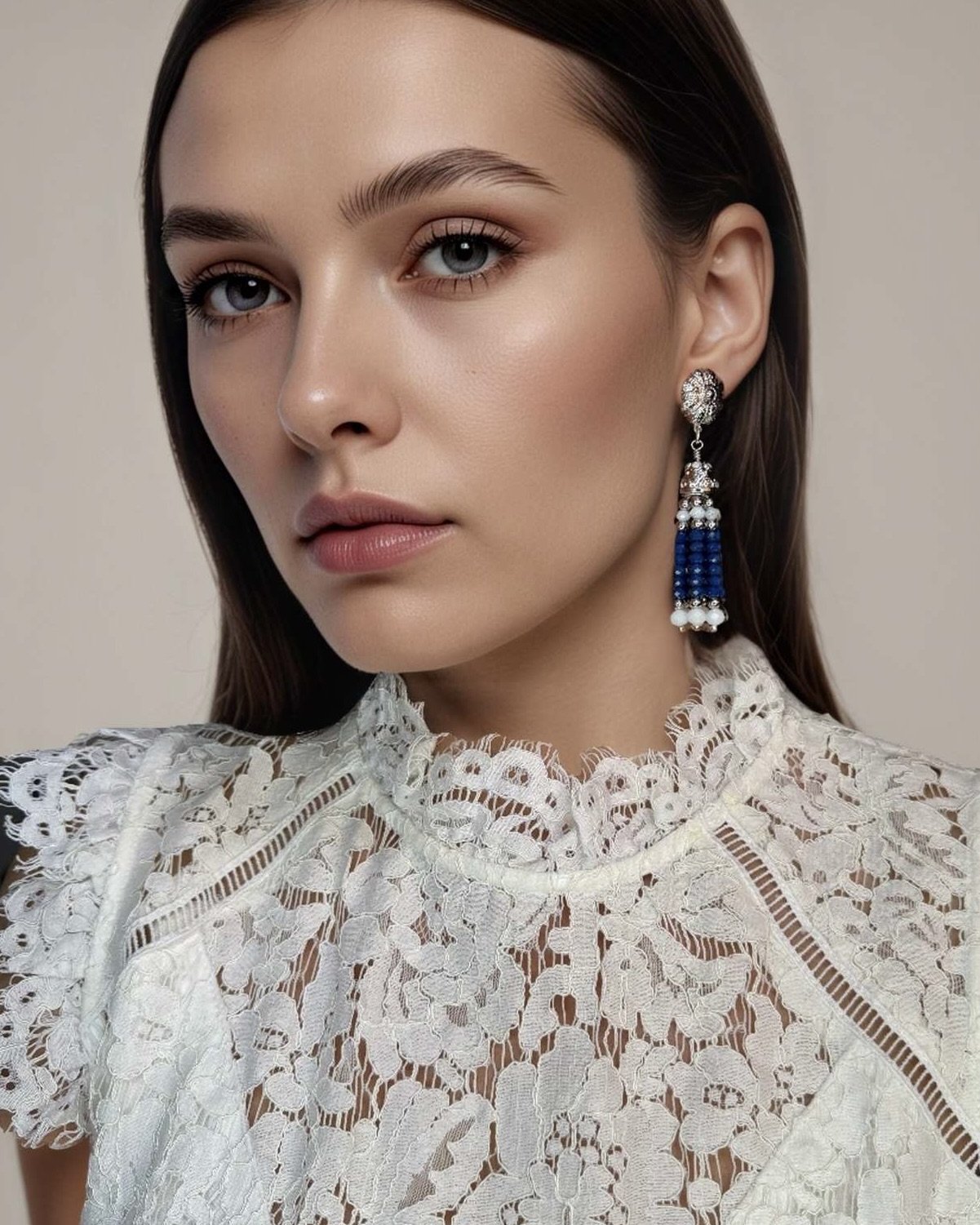 silver white and blue tassel earrings on model.jpeg