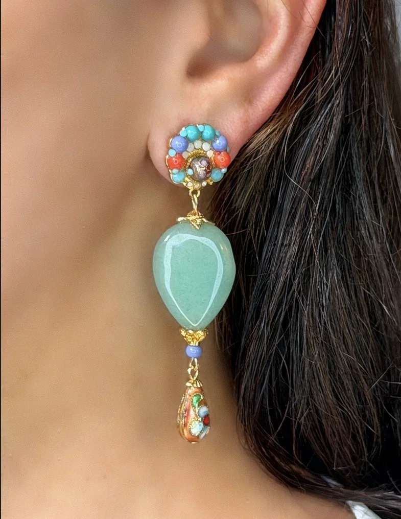 Mint green pastel drop earrings on ear.jpg