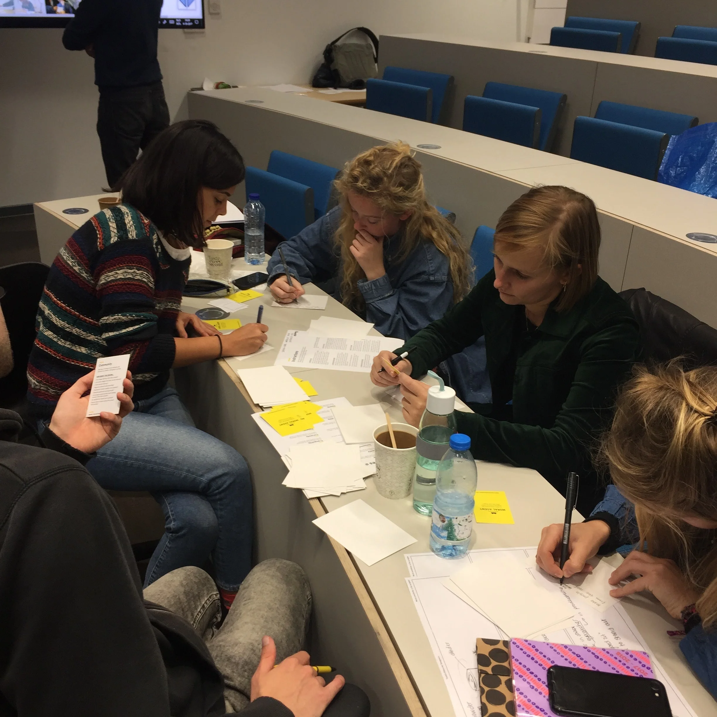 Students busy generating ideas with moral values as design inspiration.