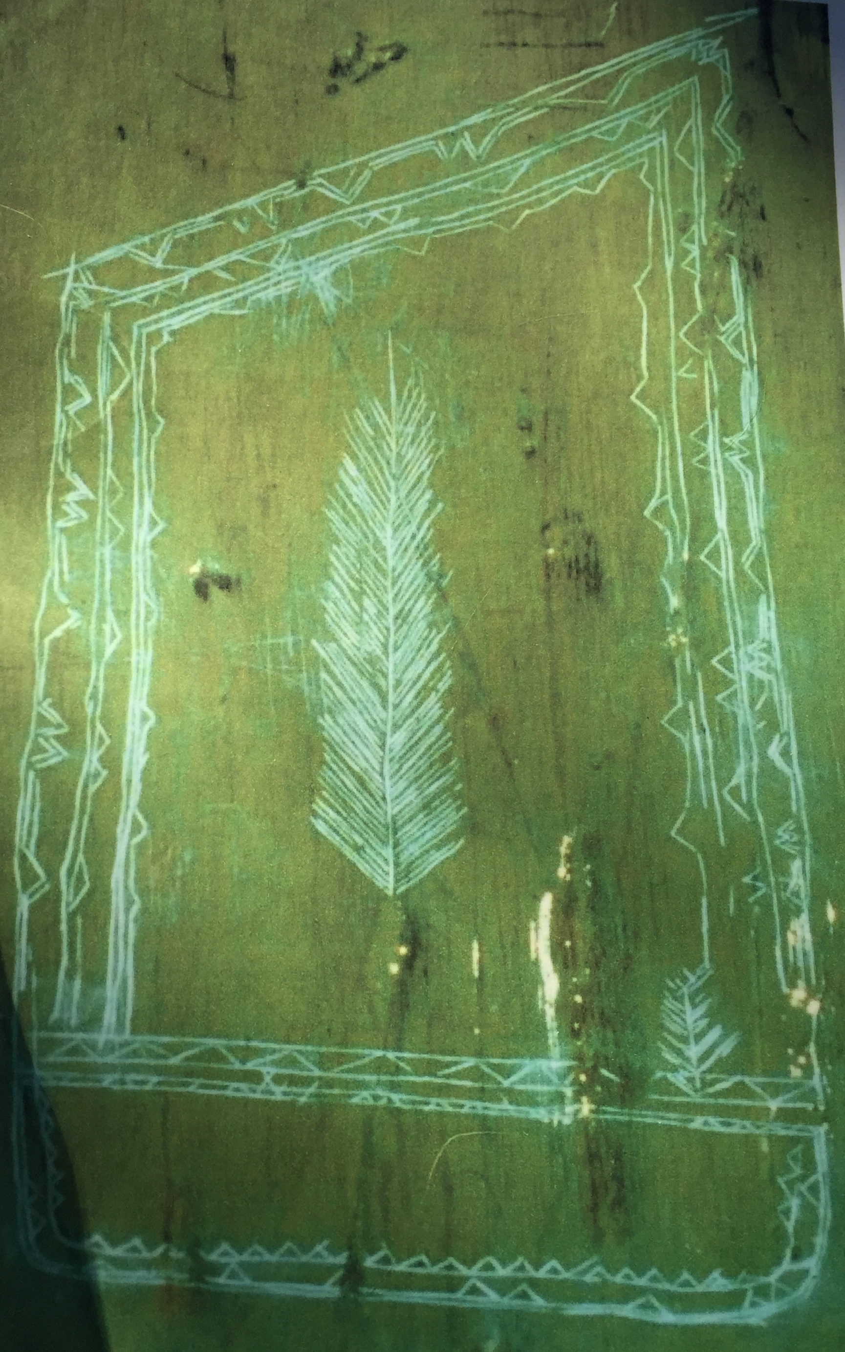 Image of the petroglyph of "The Woman's Peaked Cap."