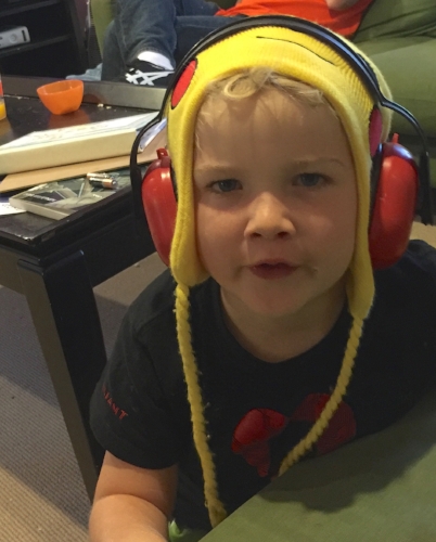 Not sure if Charlie is playing dress-up, or if this is a commentary on the instrument practice...