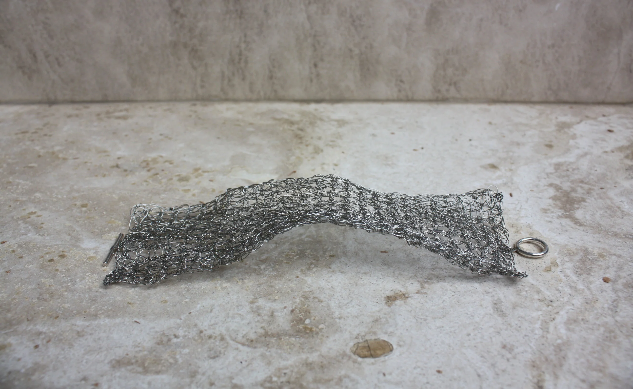 Thick Winged Bracelet Off.jpg