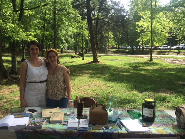 Morgan, Deep Roots'&nbsp;current intern and apothecary manager, and Cameron tabling at the Montevallo Let's Get Moving Festival!