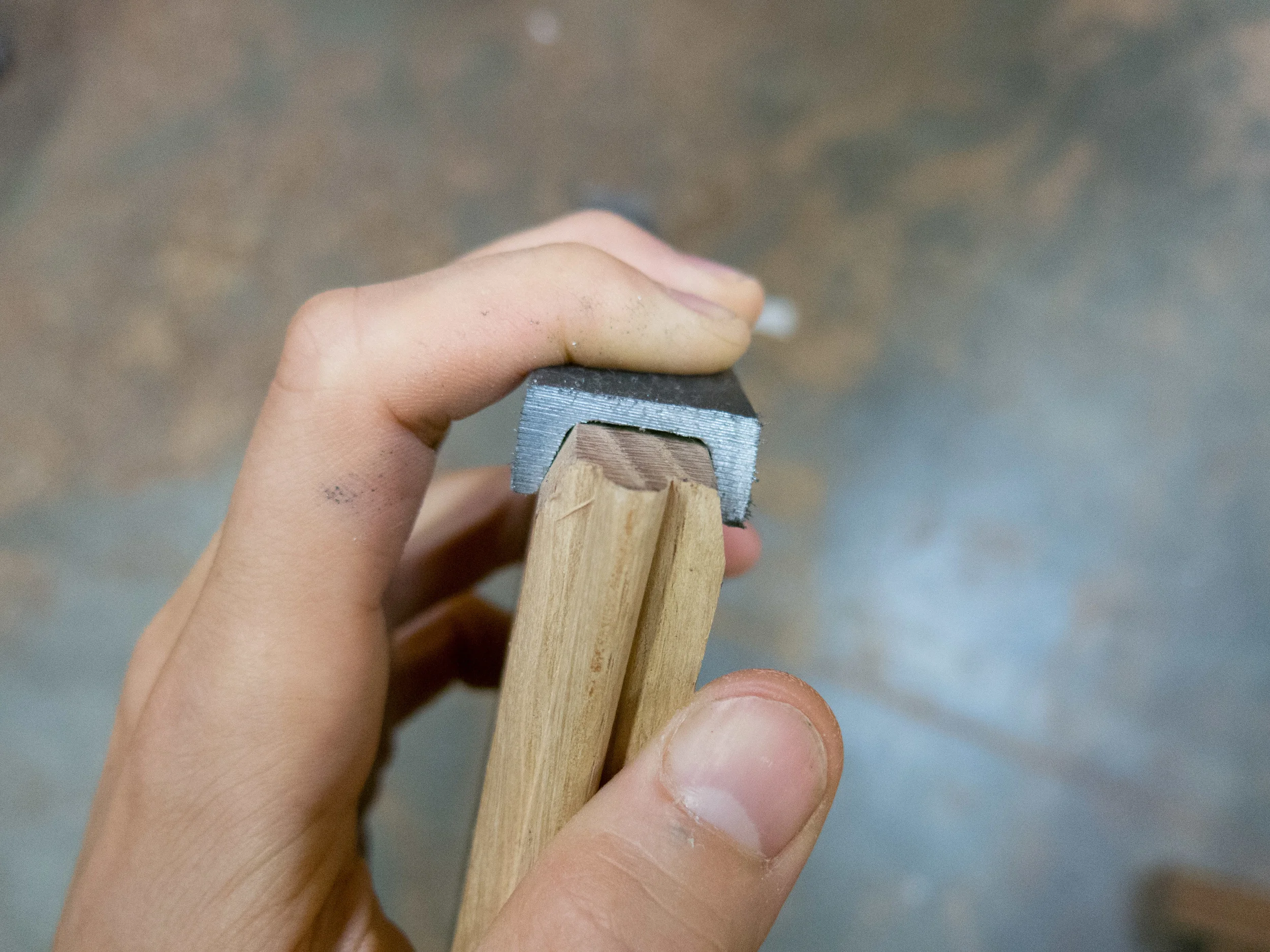 The slightly tapered ends of the slats are clearly visible here. Removing a small amount of wood from each slat allows it to fit comfortably within the c-channel's profile.