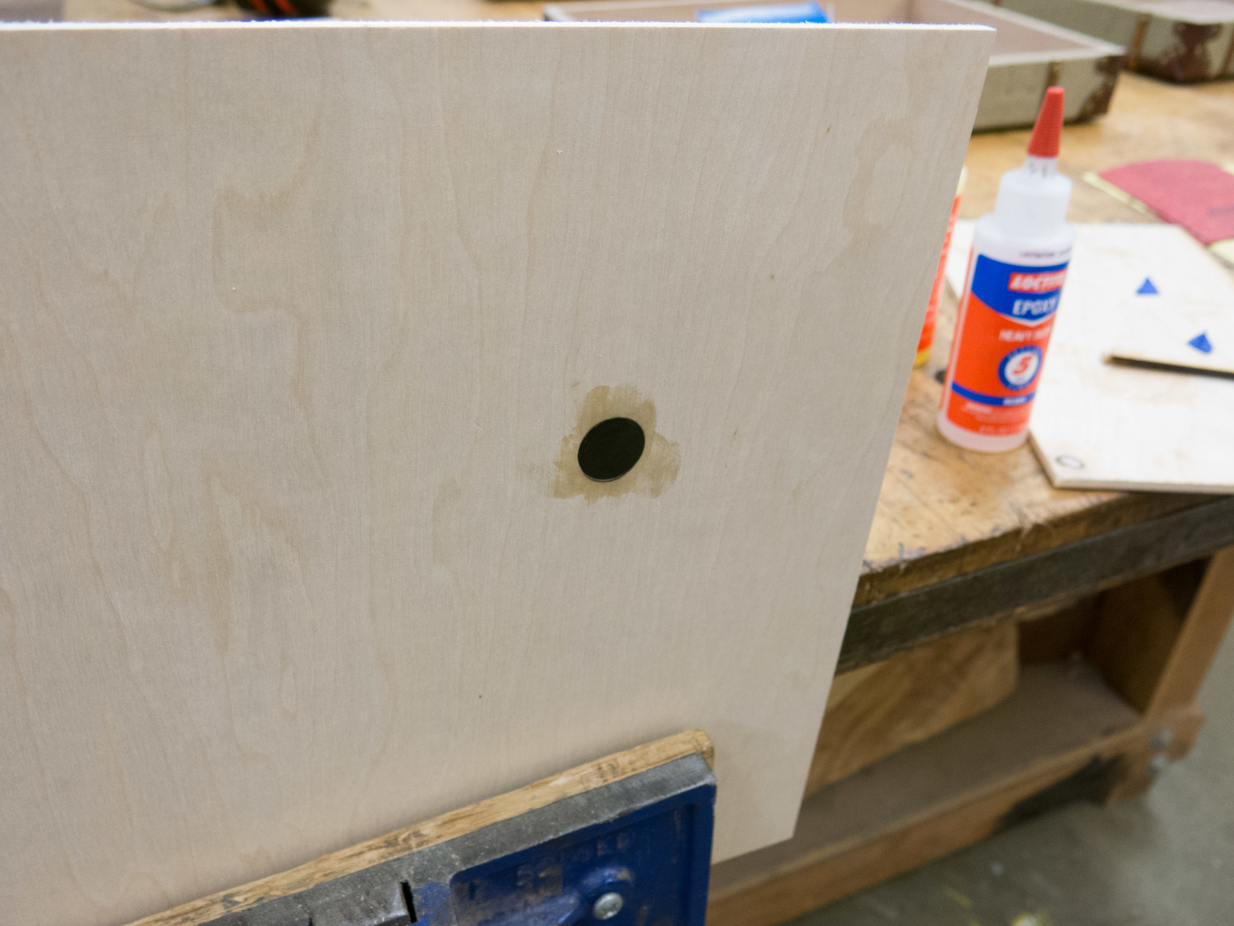In order to keep the display box in place a magnet was epoxyed into the lid. Ultimately this was covered with the map so you can't see or feel the magnet.