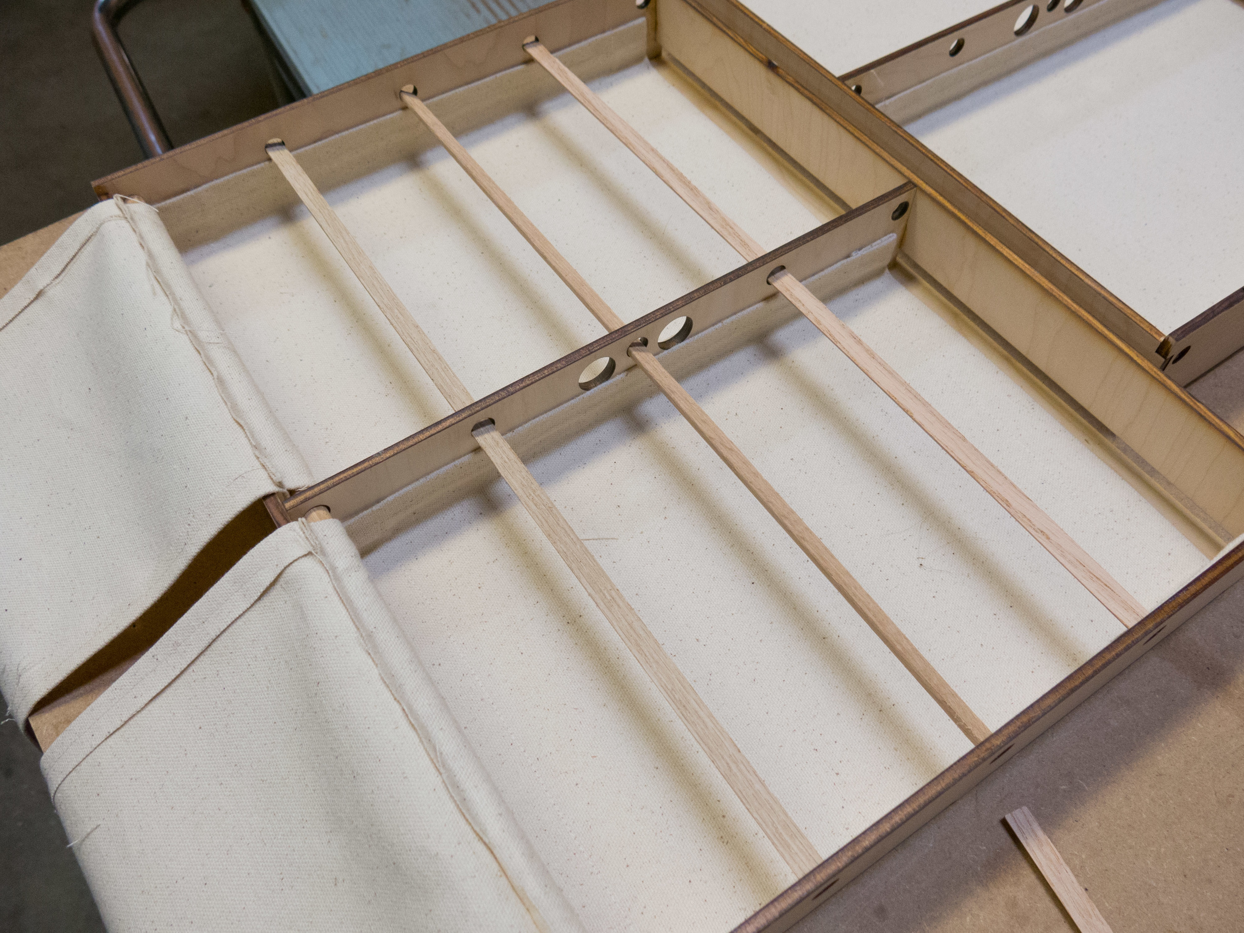 Fabric step 3 - Half of the dowels in place, ready for the fabric to be place on top.
