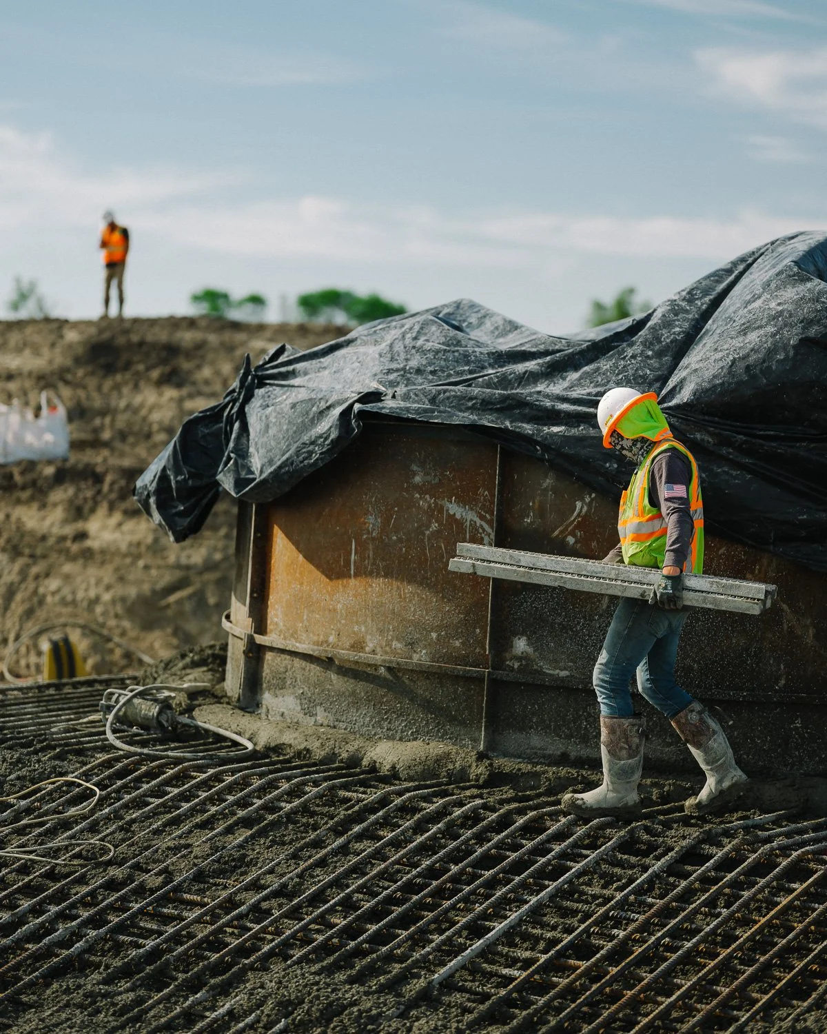  Workers pour concrete below grade for the base of a new wind turbine at the Milligan 1 Wind Farm Project, Western, NE, for The New York Times, 2020 