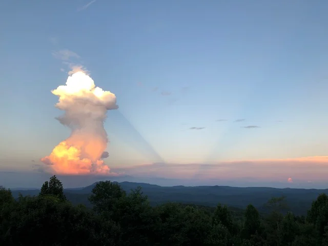 Rare anti-crepuscular rays produced by cloud as it appears to be set on fire during WNC sunset Time-lapse include
