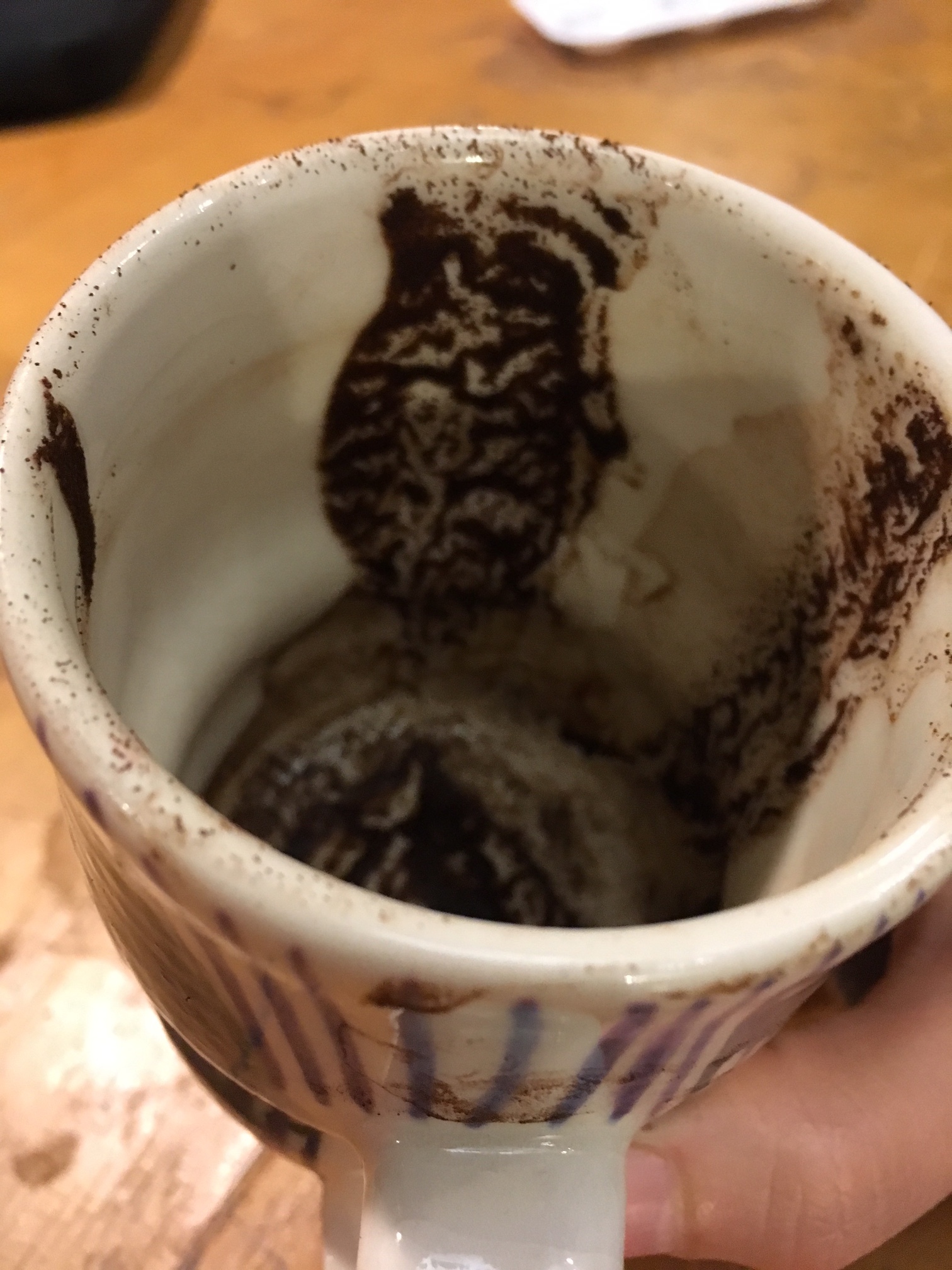   The Hum: Tasseography, the art of reading coffee grounds. (An owl in the grounds.)    The Hum  is a socially engaged artwork that integrates and adapts the coffee house model for co-learning, co-creating, and co-working. Resilience resides in a wil