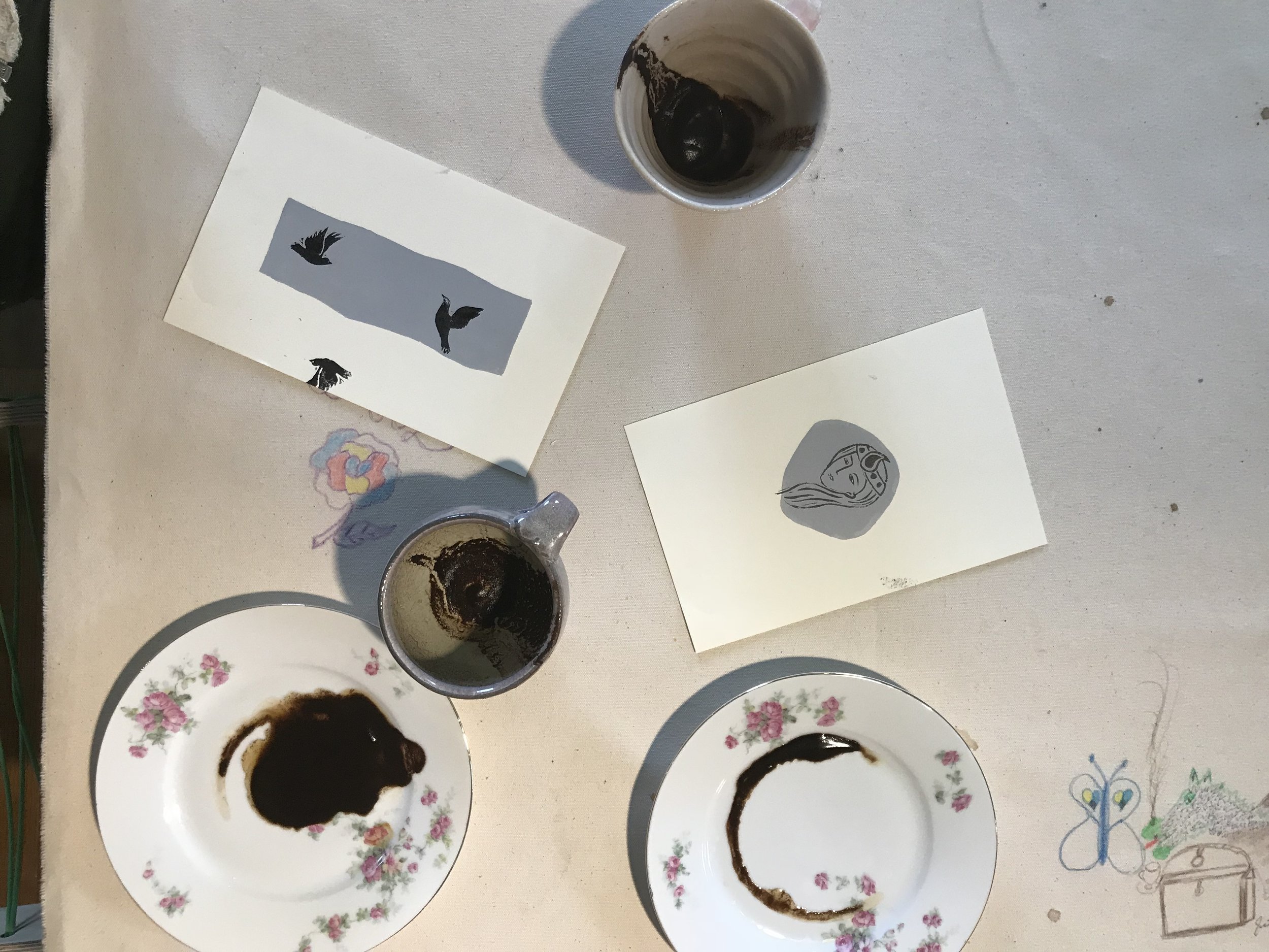   The Hum: Tasseographic prints. Coffee grounds are “read” and corresponding rubber cuts and prints are generated.    The Hum  is a socially engaged artwork that integrates and adapts the coffee house model for co-learning, co-creating, and co-workin