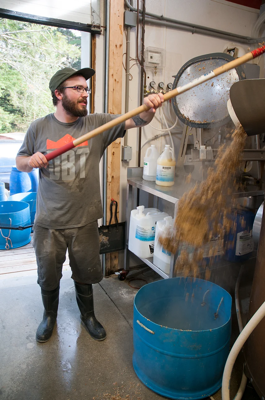 090914_Shovelingwheat_AndrewFosterPhoto.jpg
