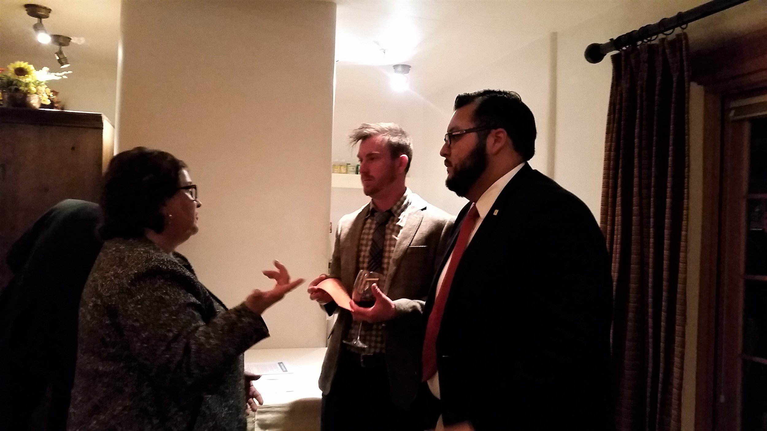 Above : Former Health Secretary under Governor Bill Richardson, Patricia Montoya talking with students in the MHA program, Stetson Berg and David Medrano