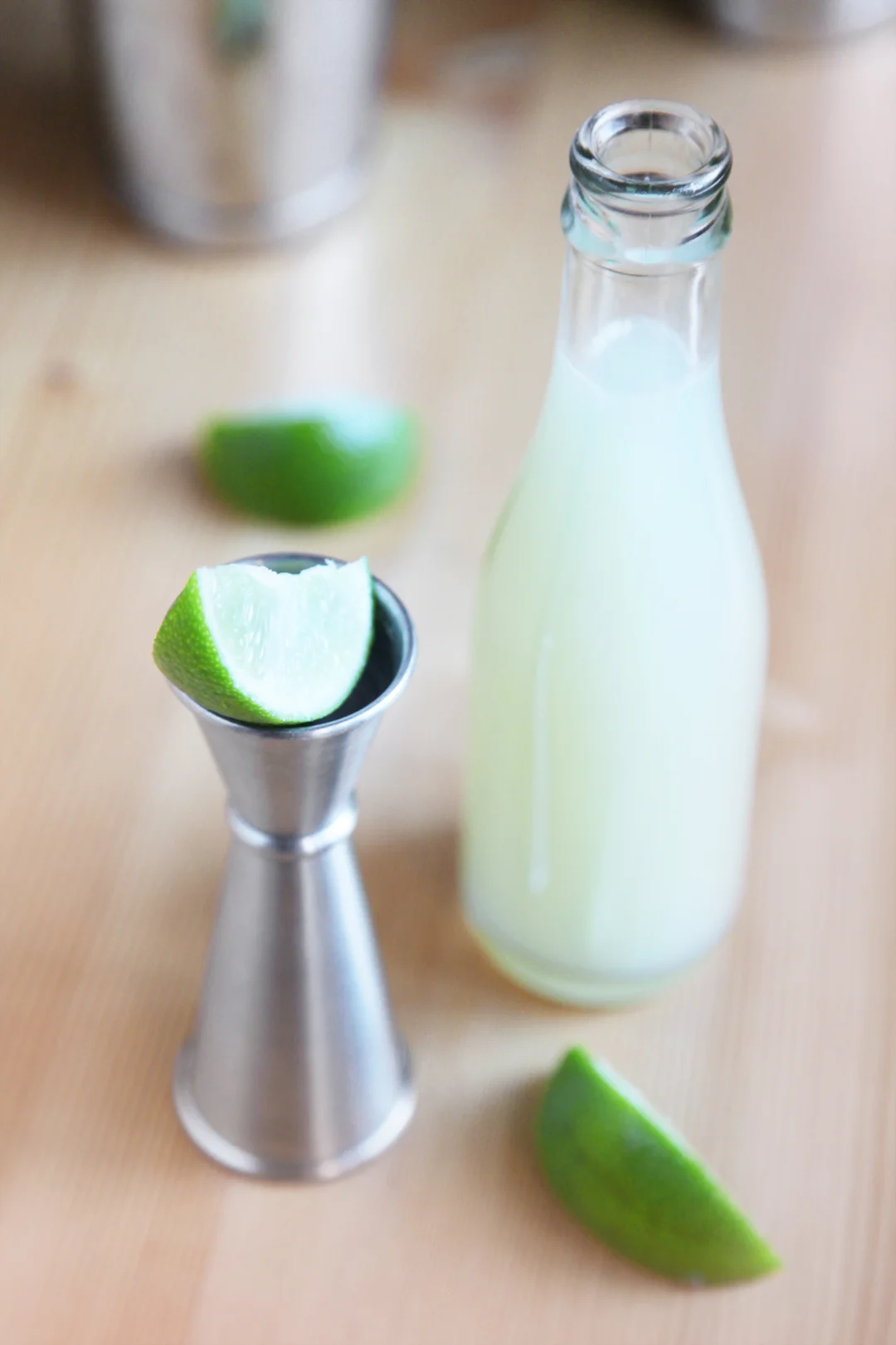 One ounce of freshly squeezed lime. Always go for fresh lime - the acids in old or preserved juice don’t pop as much as a freshly squeezed (and strained!) batch of citrus.