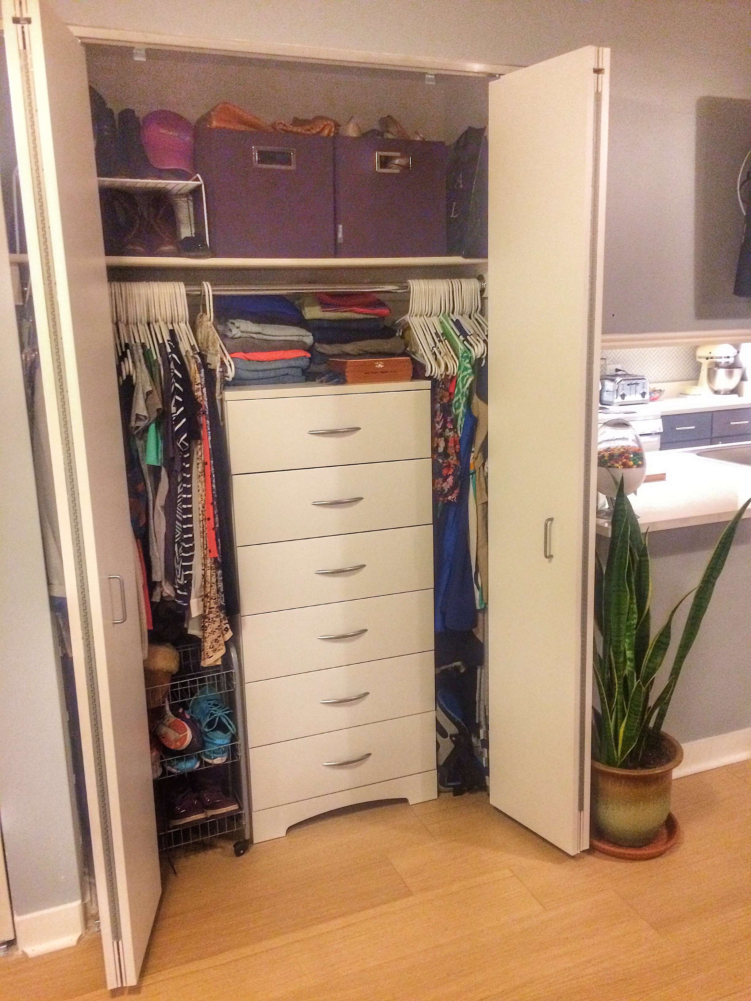 His and hers closets are highly organized for personal space and storage.