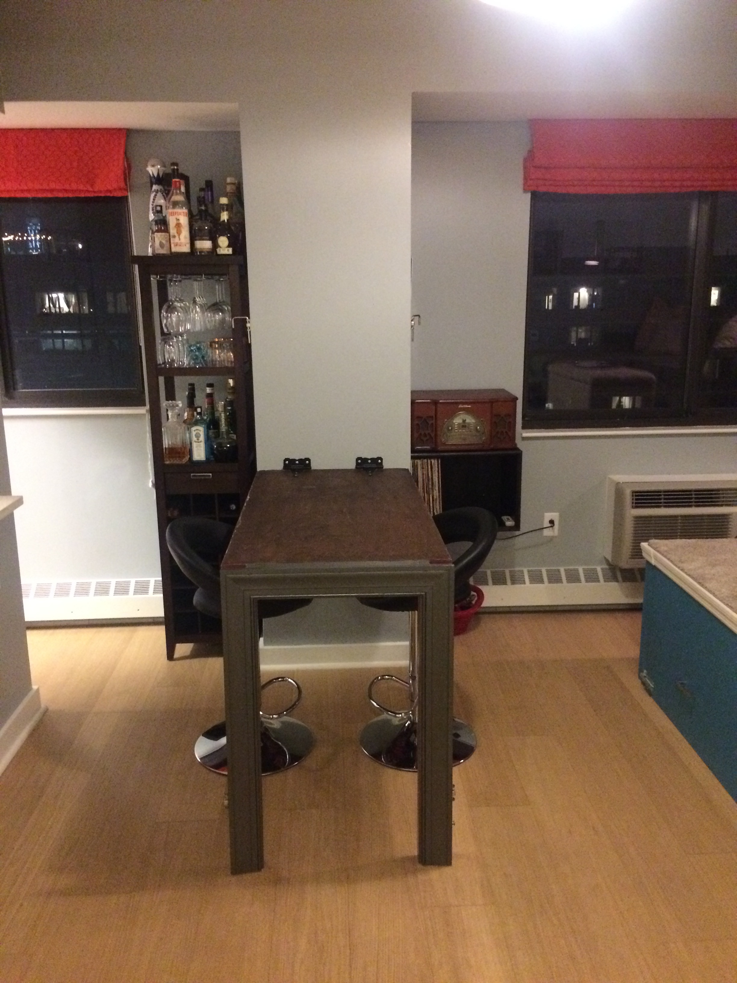 When the table is folded down it comfortably seats 4.