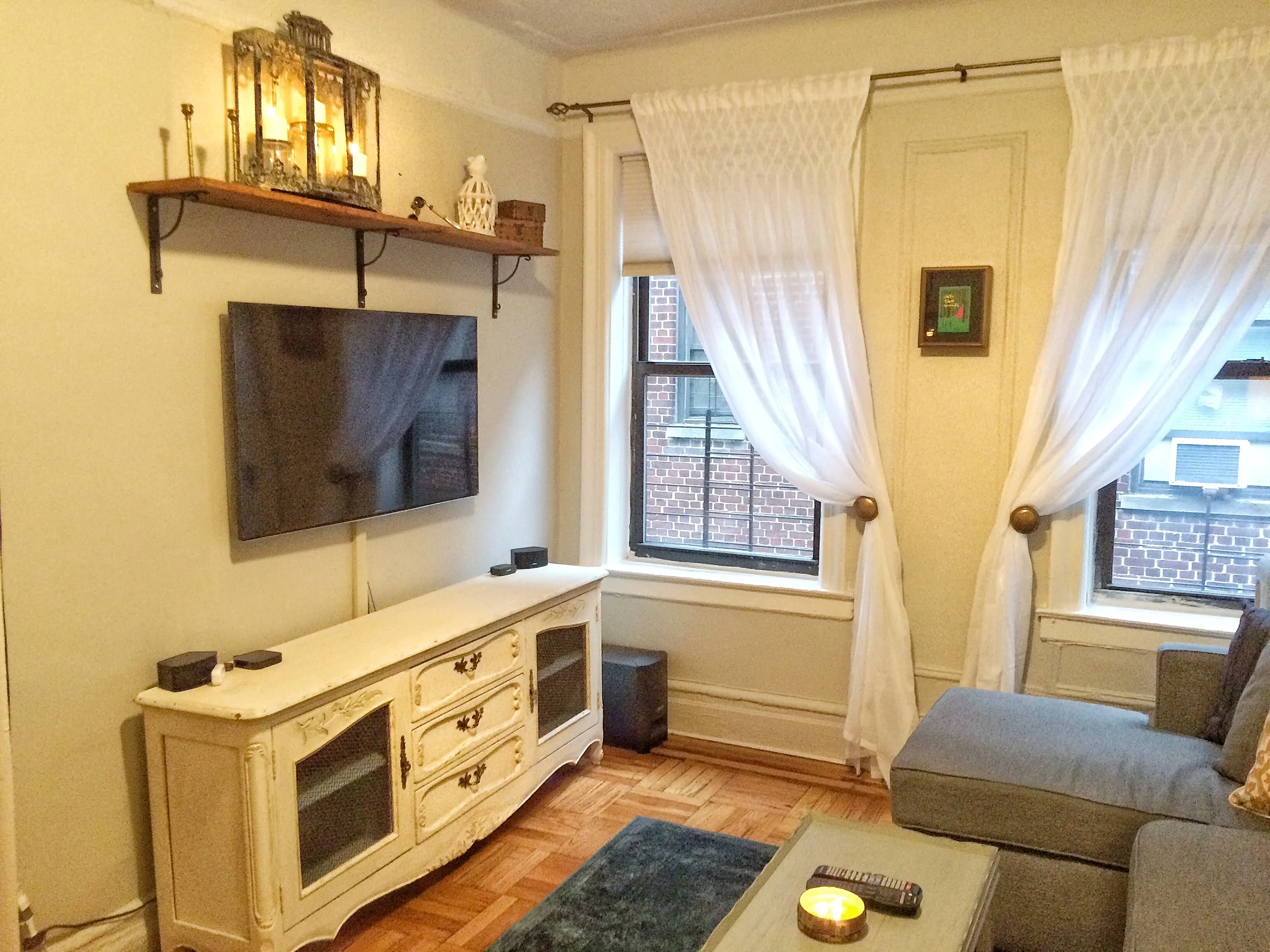The length and height of the shelf balances the TV console and keeps the top of the console clear of clutter.