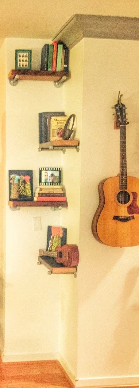 Stacking shelves in this corner, created heigh in the studio as well as a playful and fun way to use an otherwise useless corner.