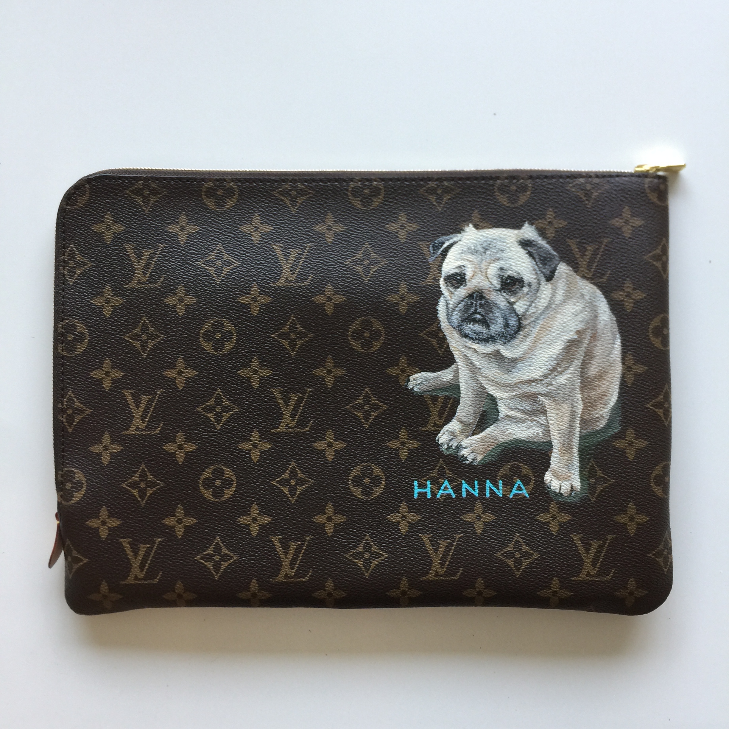 Hanna on a Louis Vuitton clutch, for Lisa Halmos.