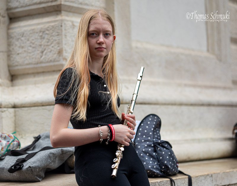 Young musician practicing her flute 