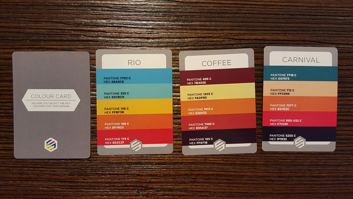 There are 20 color cards. Each card is a curated palette with hex codes and pantone numbers. These three color palettes were some of my favorites.