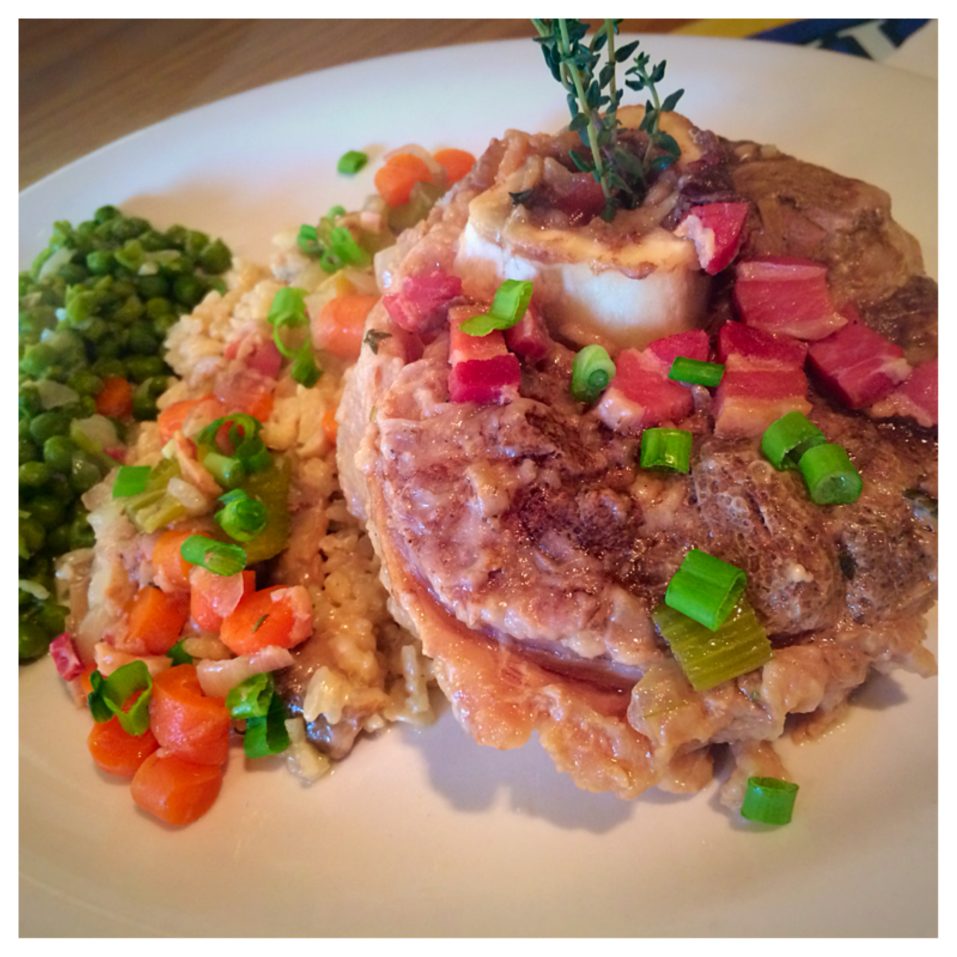CHRIS PAIRED THE TRADITION MILANESE DISH, OSSO BUCCO, WITH A CREAMY MUSHROOM RISOTTO AND SAUTEED PEAS WITH ONIONS
