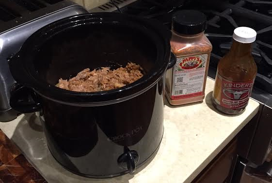 THIS IS A PICTURE OF SAN FRANCISCO FIREFIGHTER CASEY KEEFE'S WEST COAST PULLED PORK IN THE CROCK-POT. STAY TUNED FOR THE RECIPE, ALSO FEATURING A MEXICAN CARNITAS VERSION!