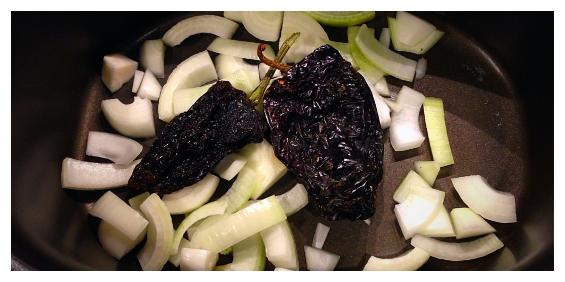  Onions with ancho chiles, which are dried poblano peppers. They are moderate in heat and provide a fruity, smoky aroma and flavor