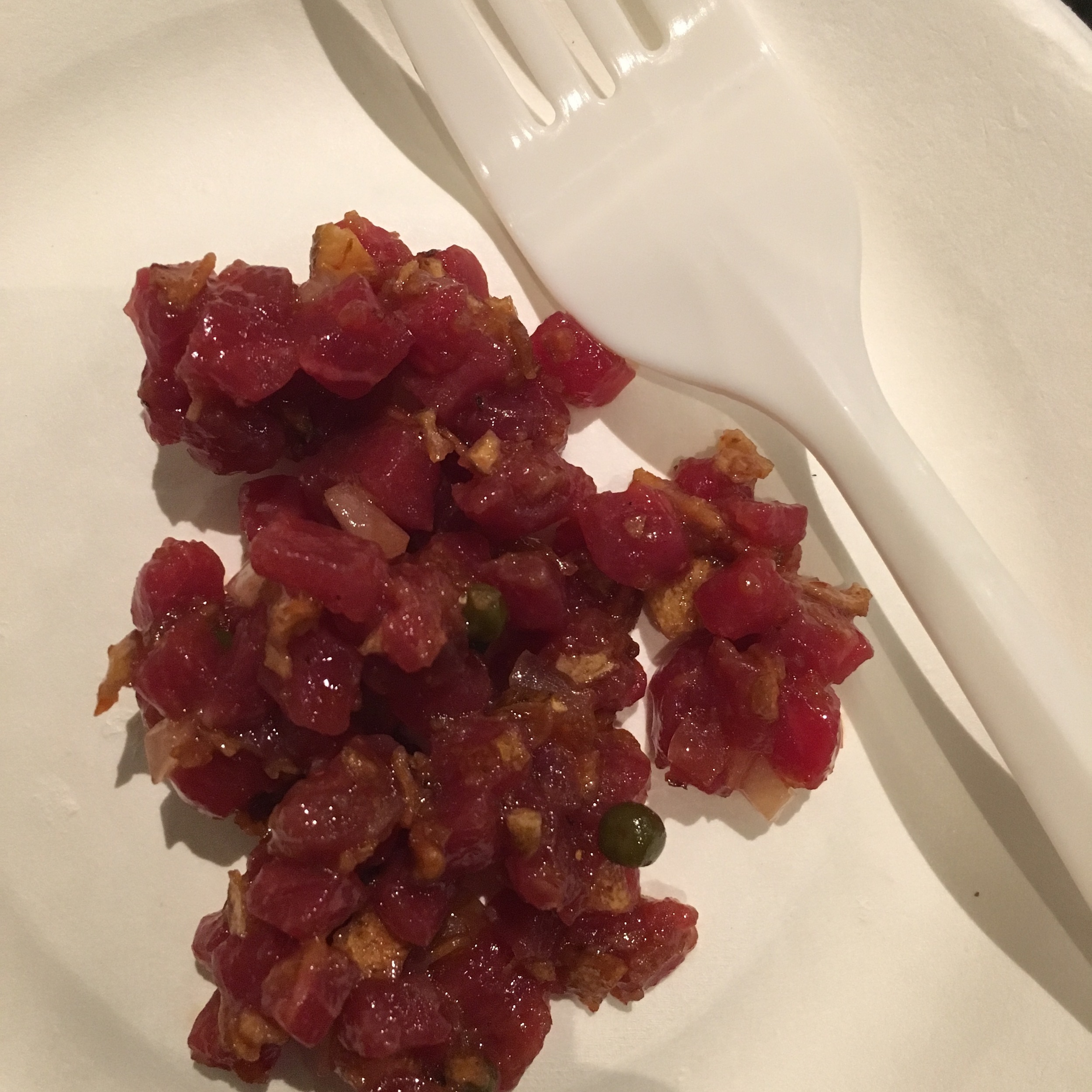 INSTEAD OF CAPERS, HE USES PICKLED ELDERBERRIES AND FRIED SUNCHOKE CHIPS TO ADD CRUNCH.