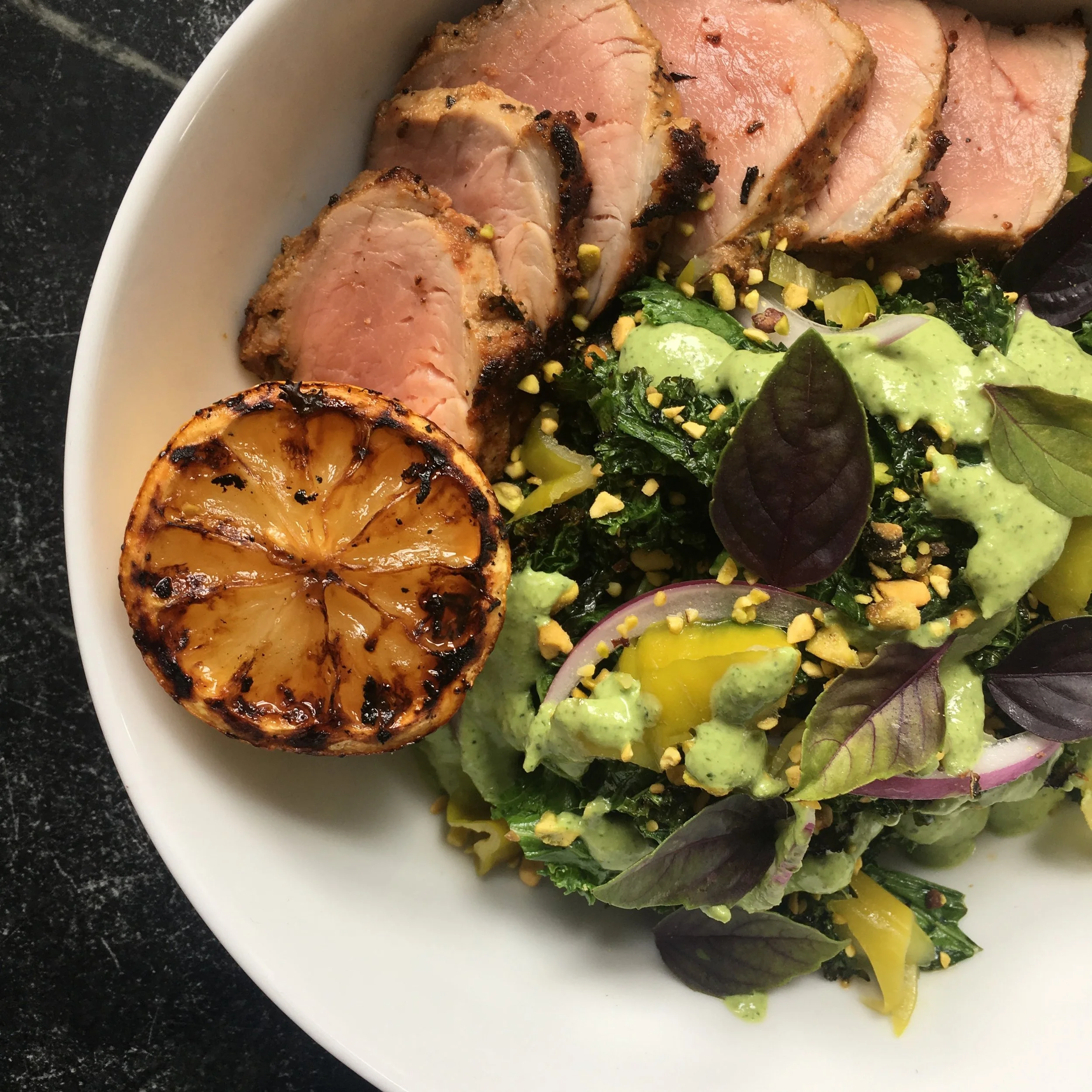 GRILLED PORK TENDERLOIN.  CHARRED KALE SALAD.  PESTO-YOGURT DRESSING