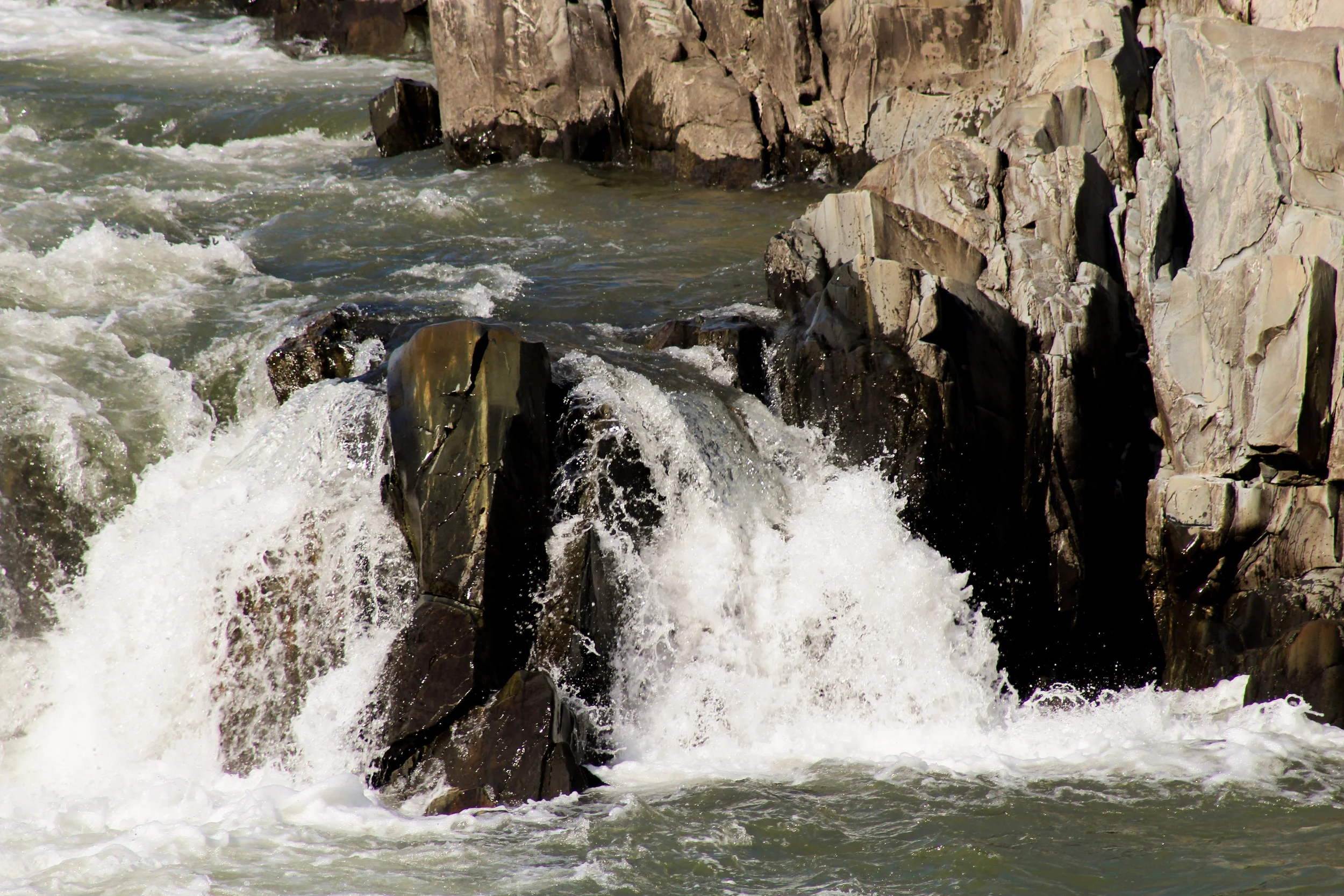 On a hot day, you might be tempted to jump into the river at Great Falls, even though it's technically illegal. But taking a nap on the rocks definitely isn't. 