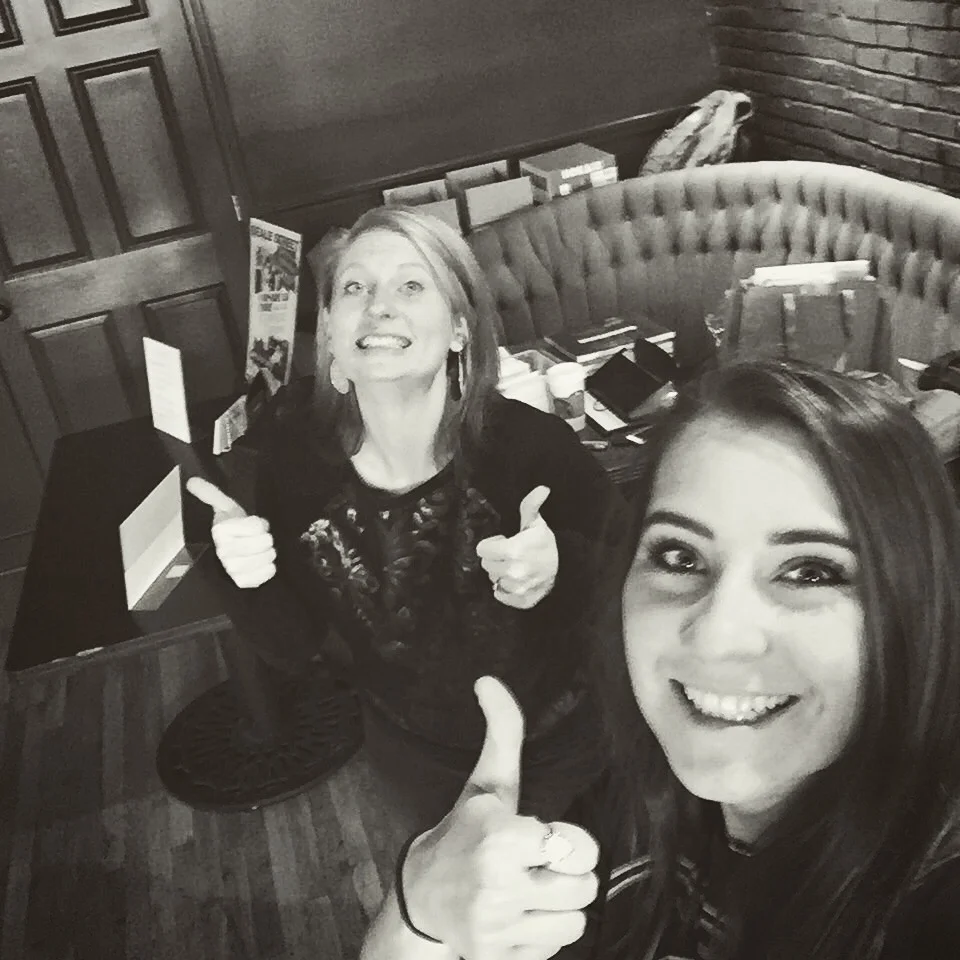 Jenn's Office Manager Jess and I upstairs at Club 152 on Beale selling books