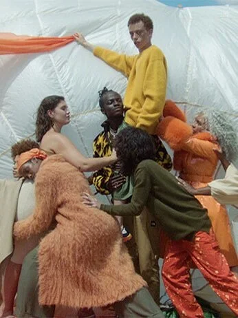 a group of people in clothing