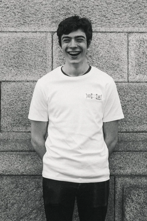 Liam, normally a medium, in the medium with another t-shirt hidden under.