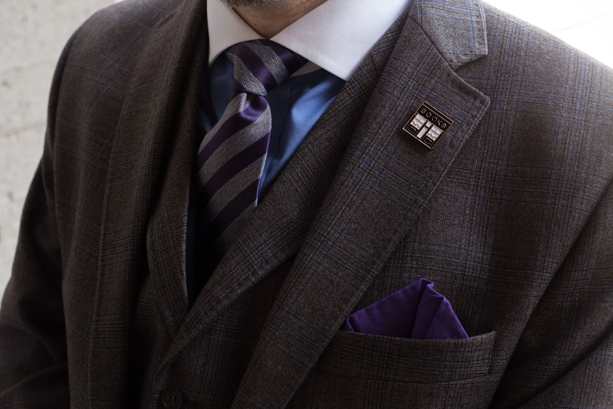 Greg in one of his well known three piece suits