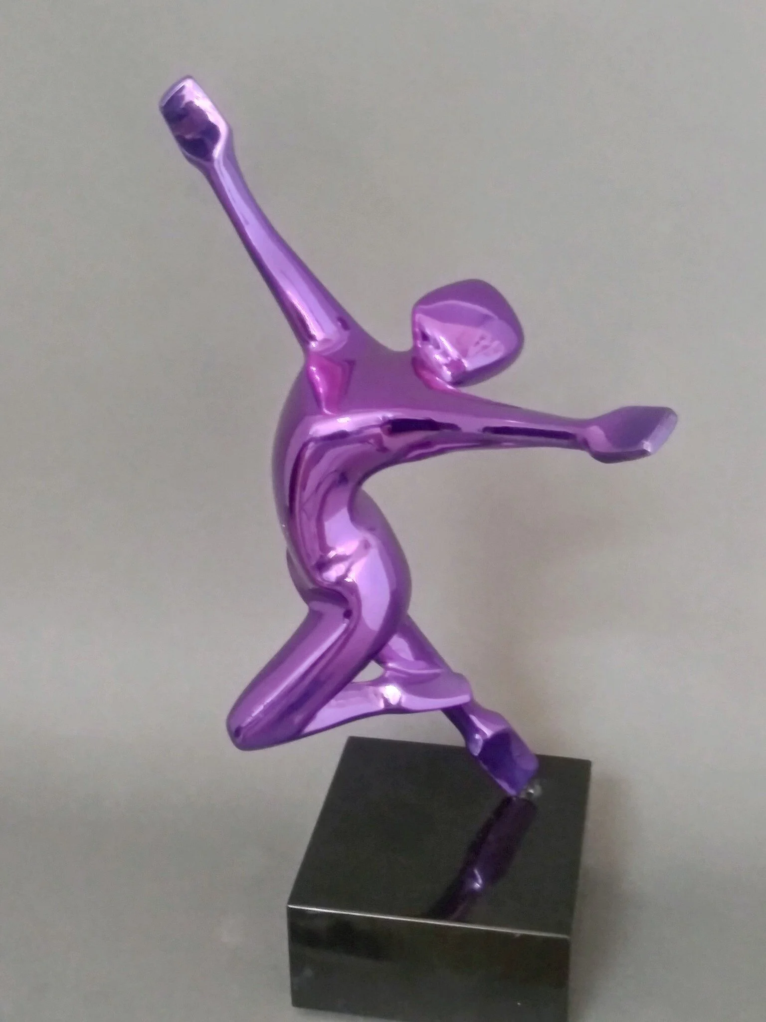 SOLD "Celebration" 12"x4"x4" cast aluminum, chromed purple finish, black marble base.
