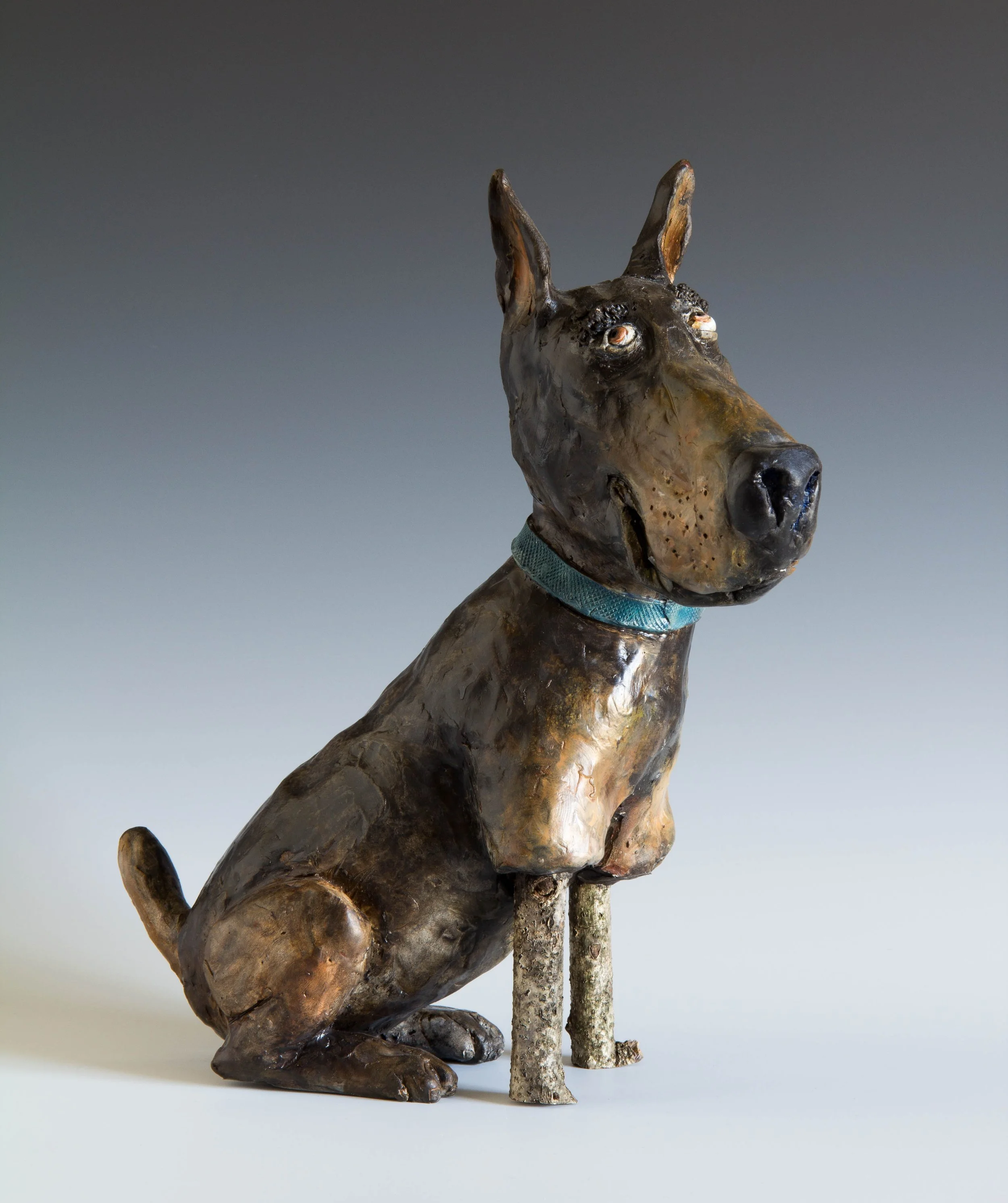 "Brownish Dog with Stick Legs" ceramic, mixed media sculpture.
